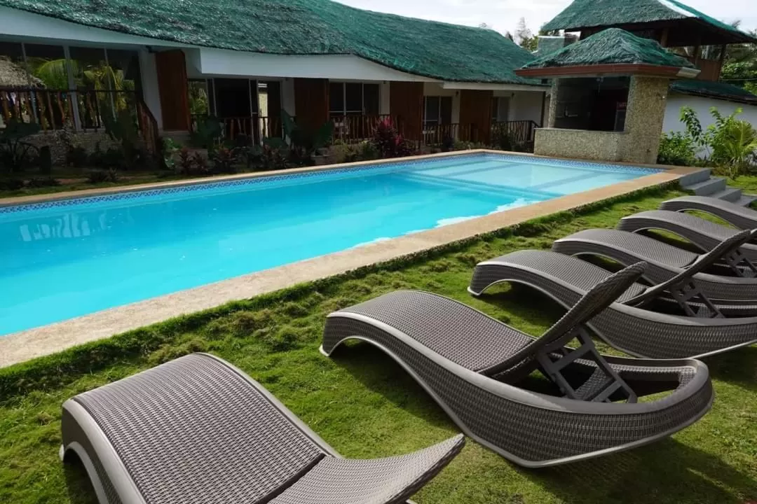 Garden view, Swimming Pool in Becano Restobar and Resort