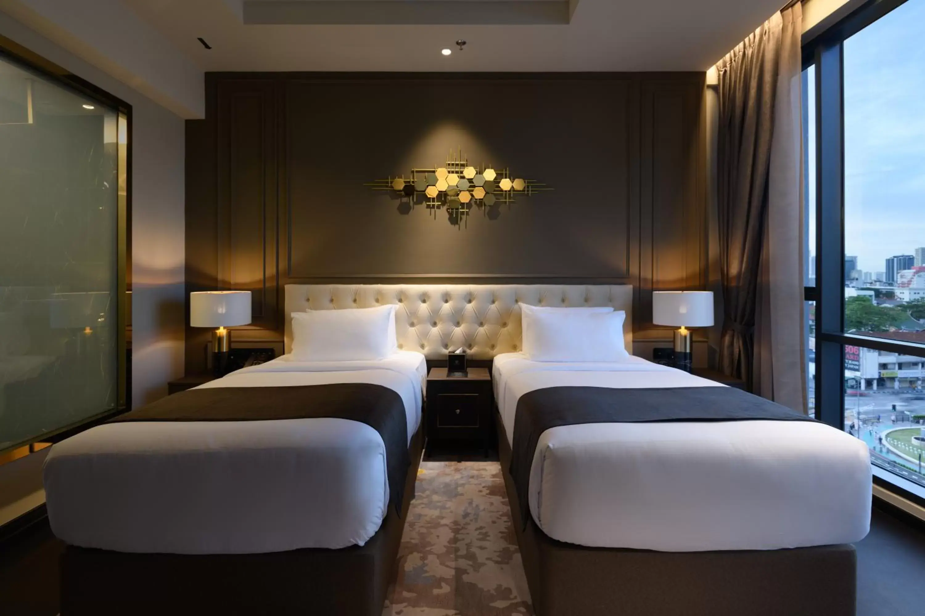 Bed in The Granite Luxury Hotel Penang