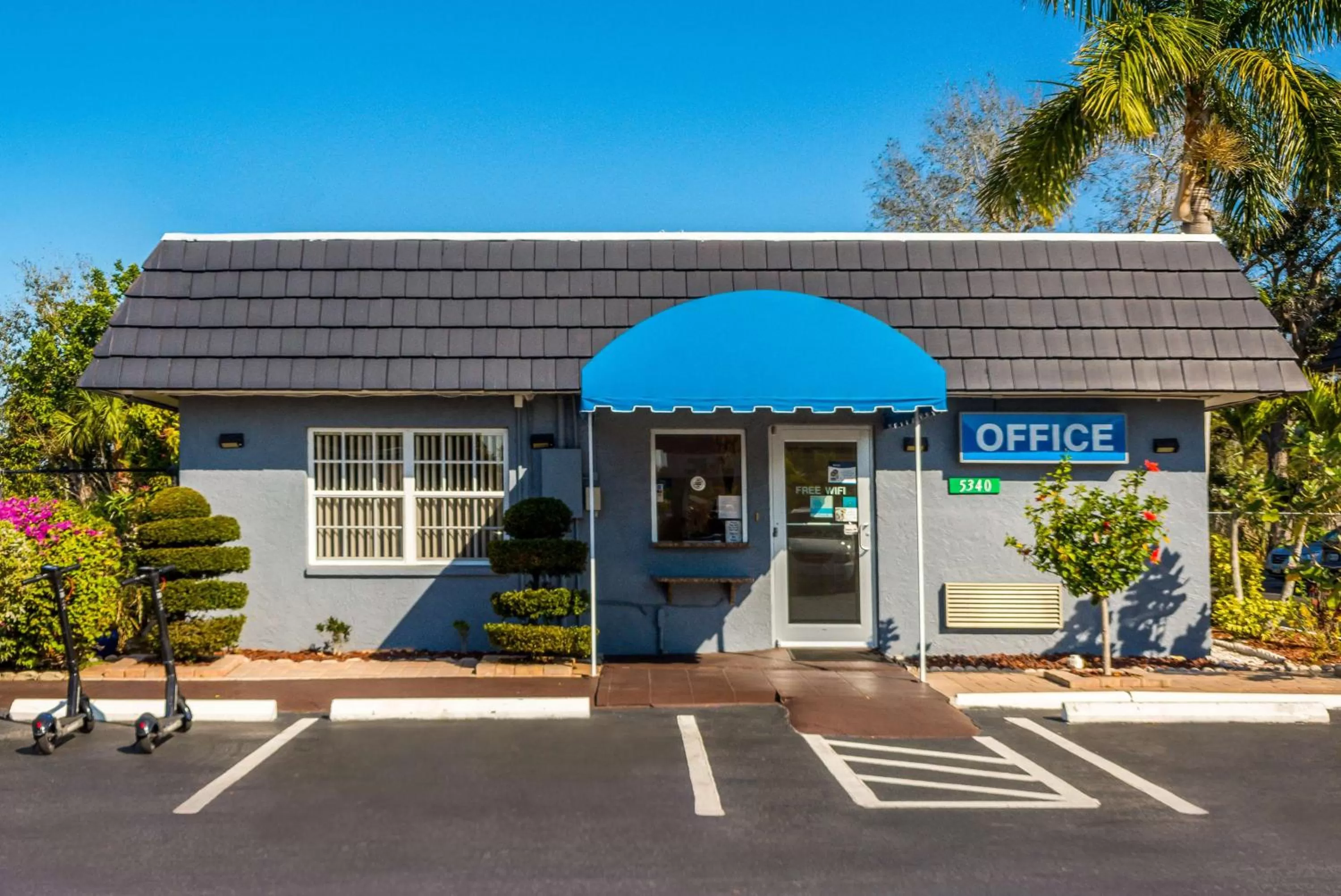 Property building in SureStay Hotel by Best Western Sarasota Lido Beach