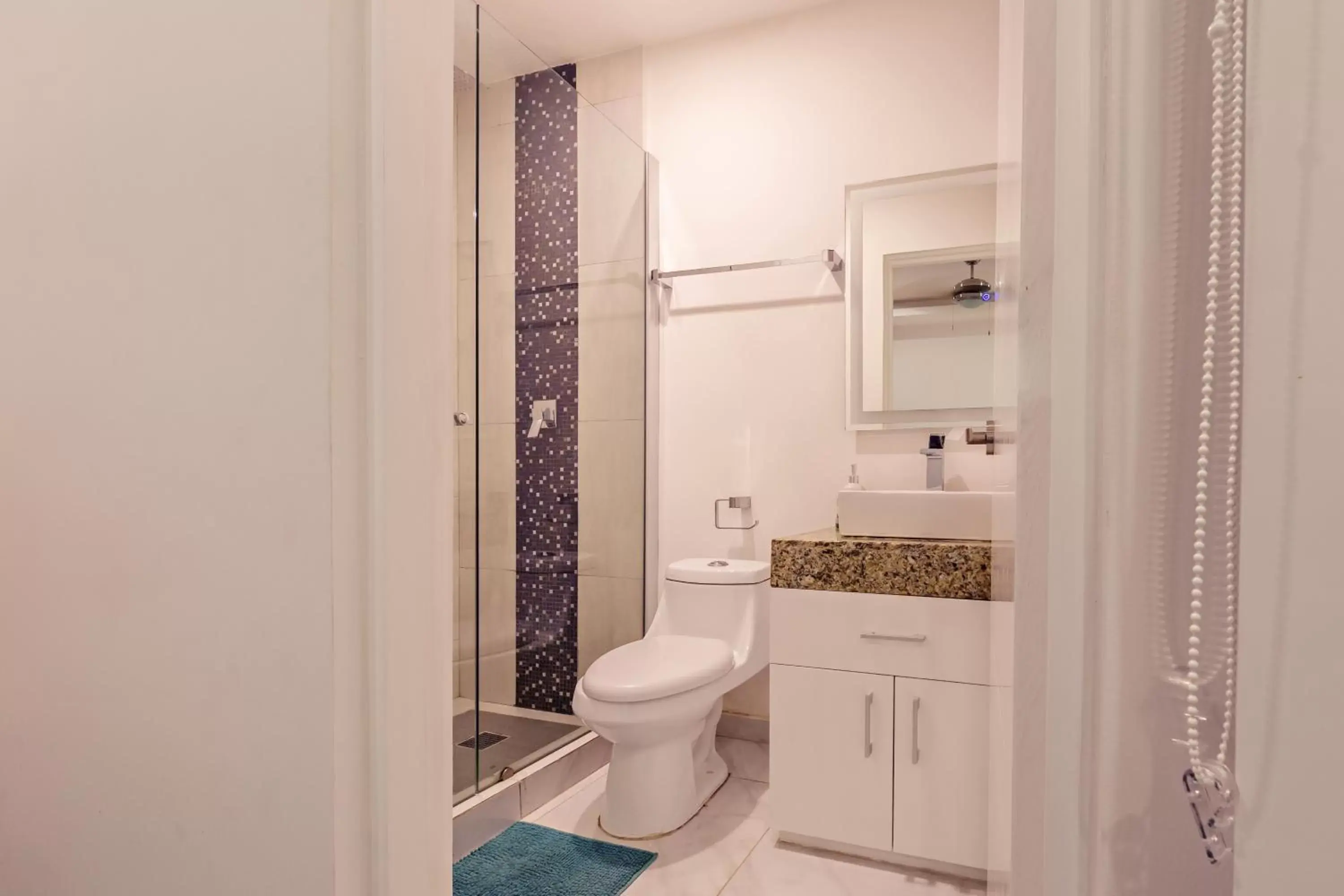 Bathroom in Mararena Condos by Nah Hotels