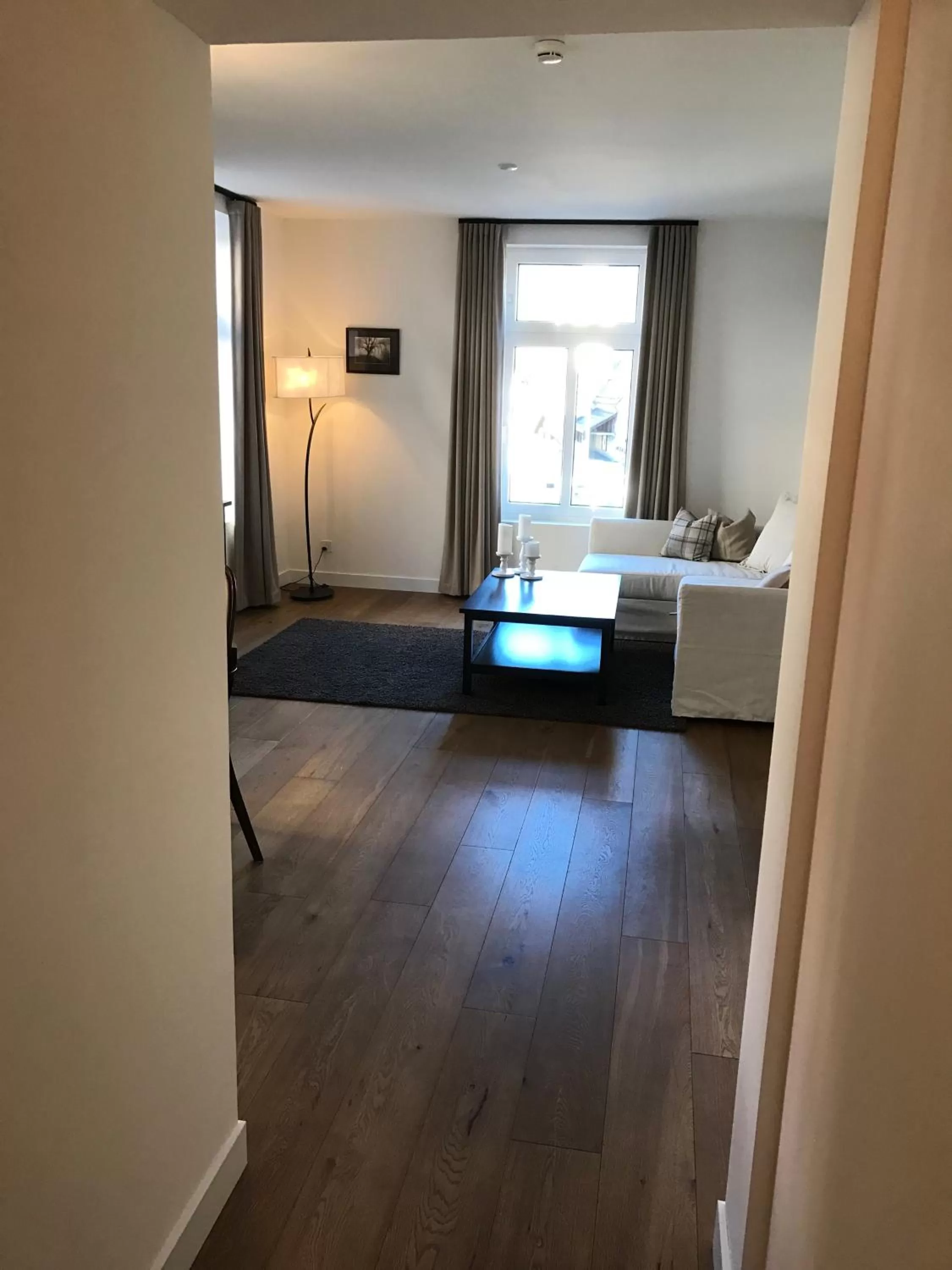 Living room, Bed in Boutique-Hotel Garni Bellevue Davos Wiesen