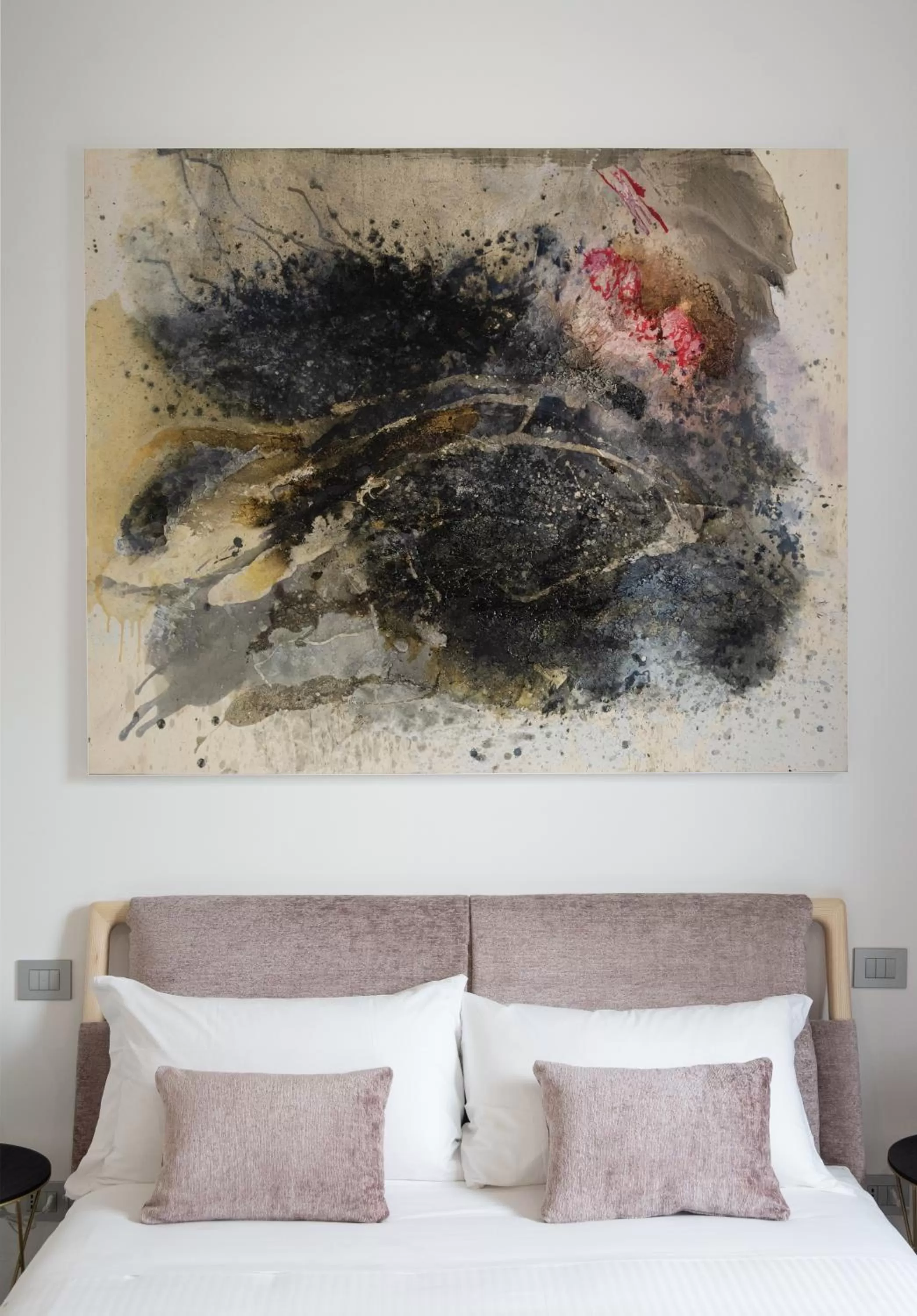 Bed in Lisetta Gardens Boutique & Suites