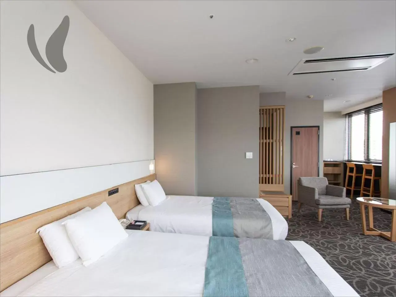 Photo of the whole room, Bed in Hotel Hokke Club Naha Shintoshin