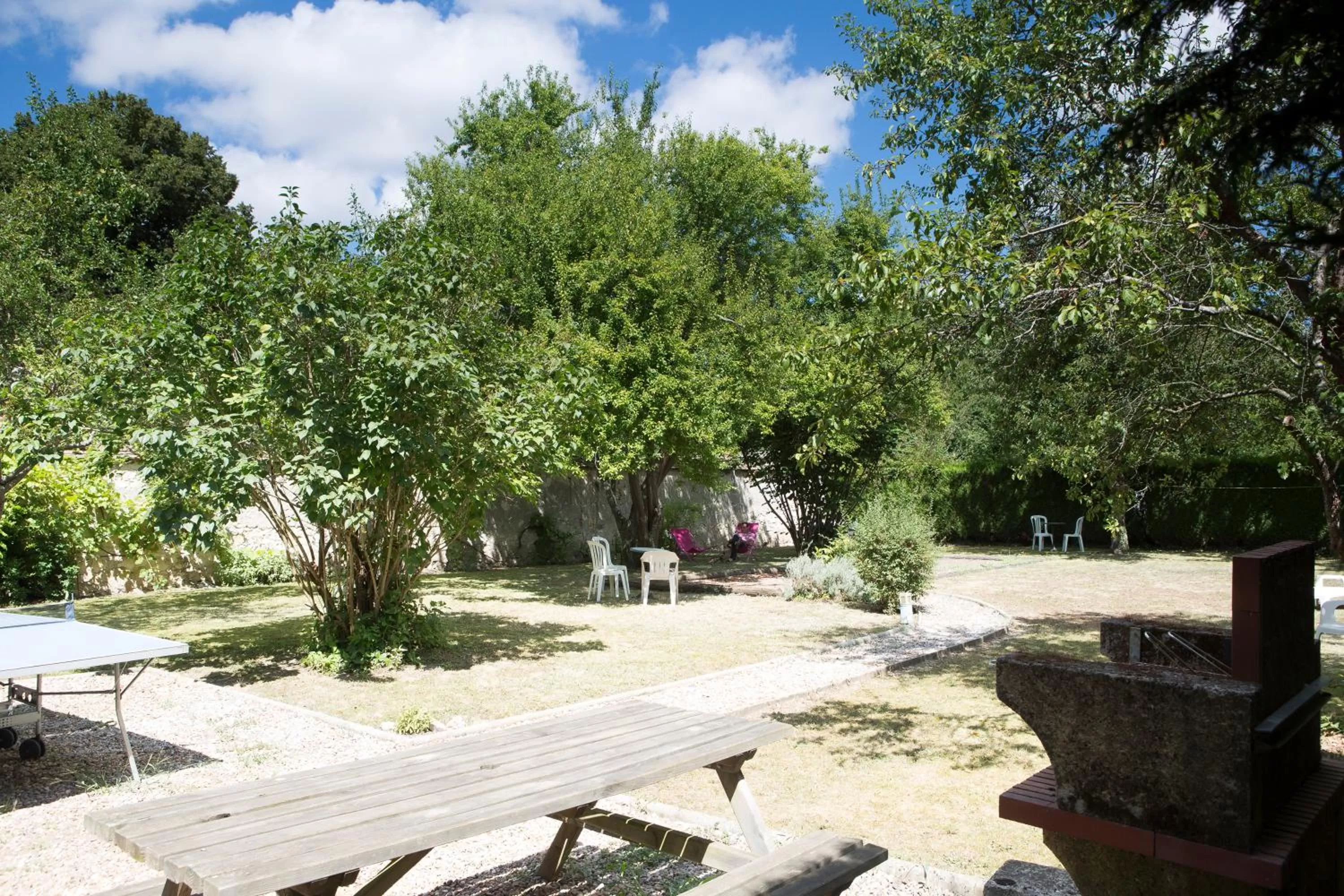 Garden in Logis Hotel Le Cerf