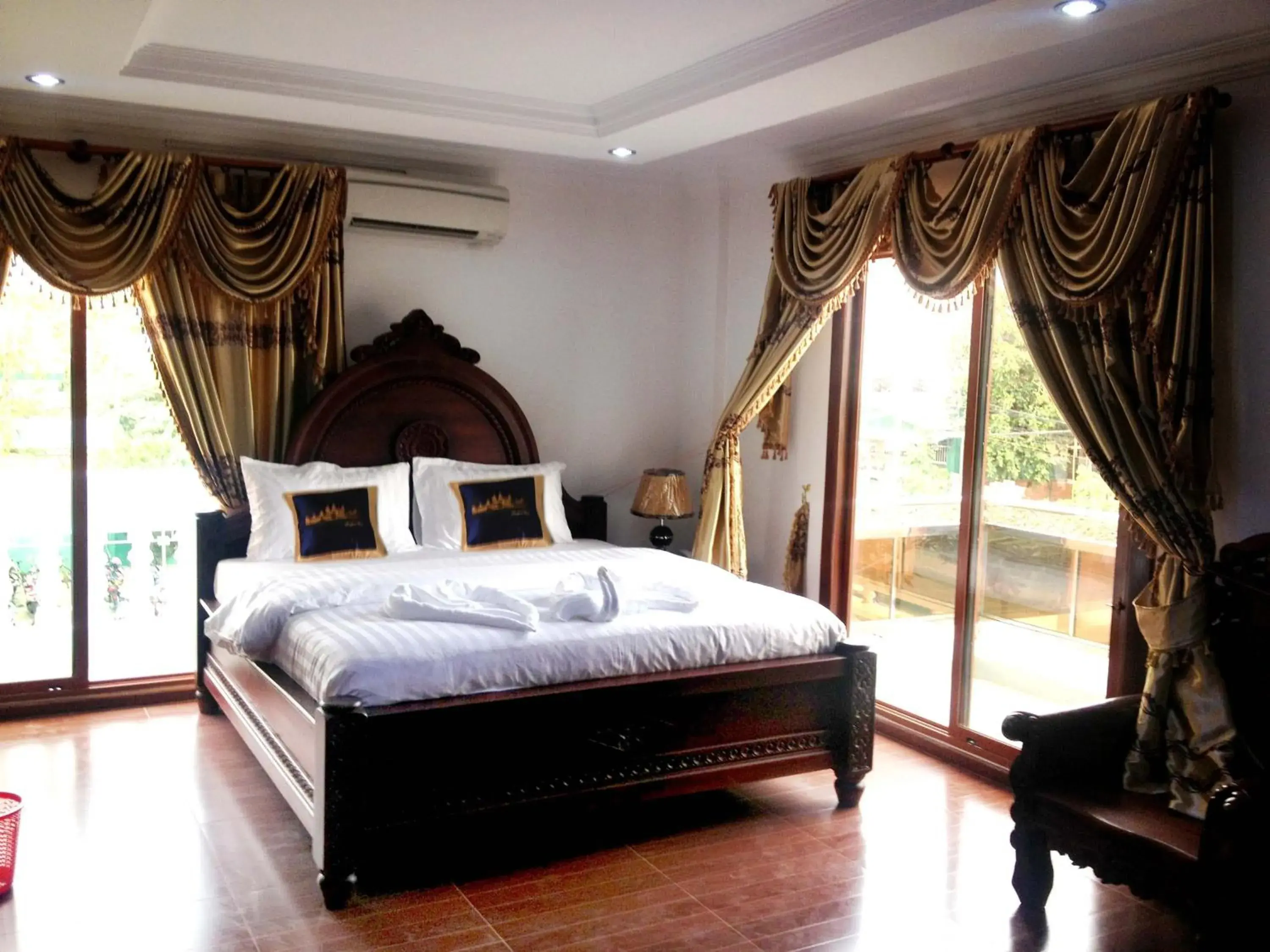 Decorative detail, Bed in Emerald Bb Battambang Hotel