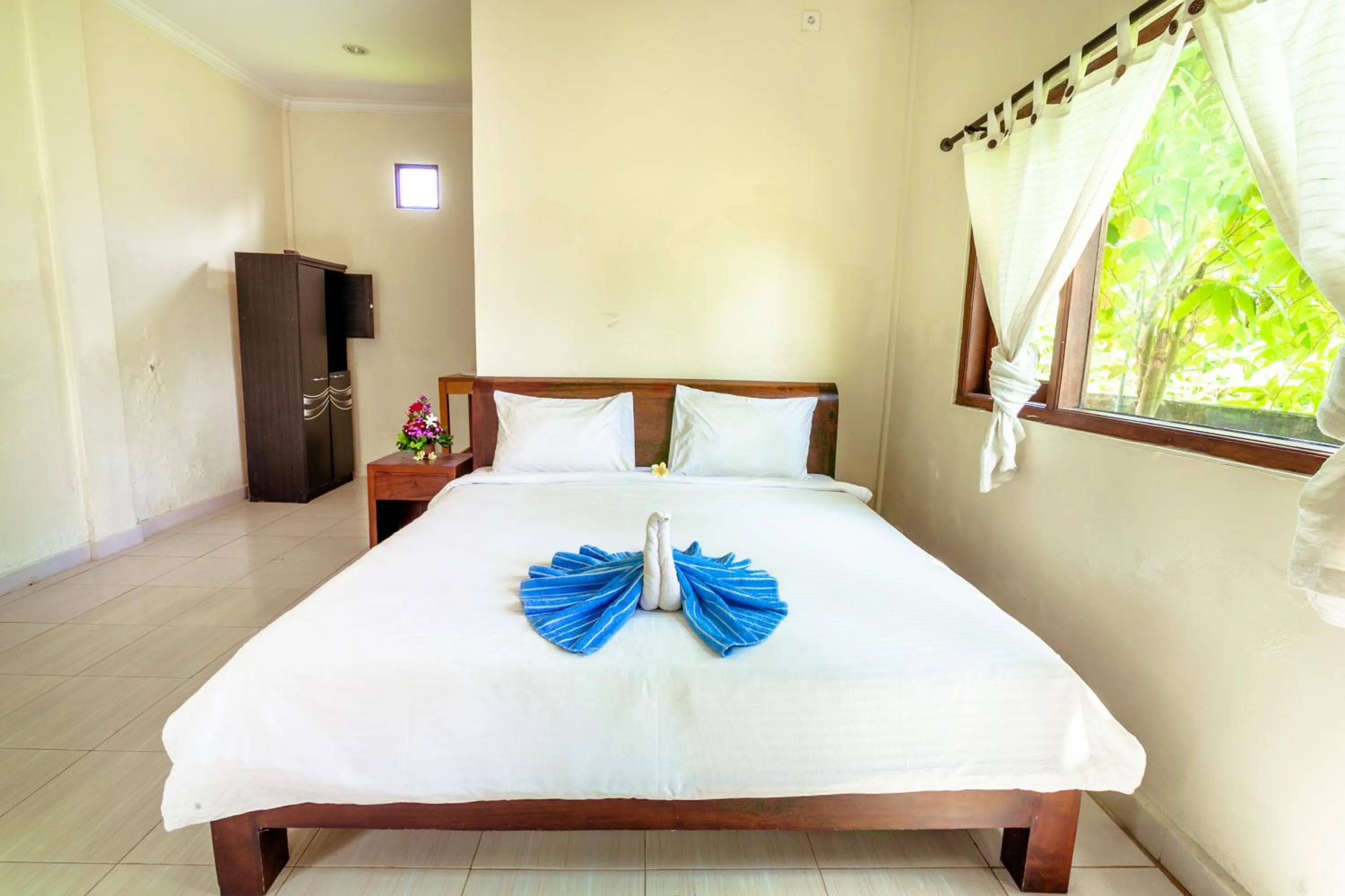 Bed in Teba House Bisma Ubud