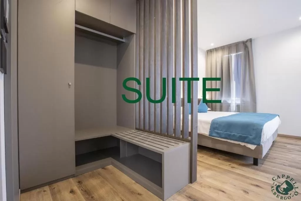 Bed in Albergo Cappello e Cadore