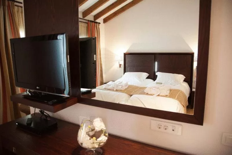 Bed in Kalavrita Canyon Hotel & Spa