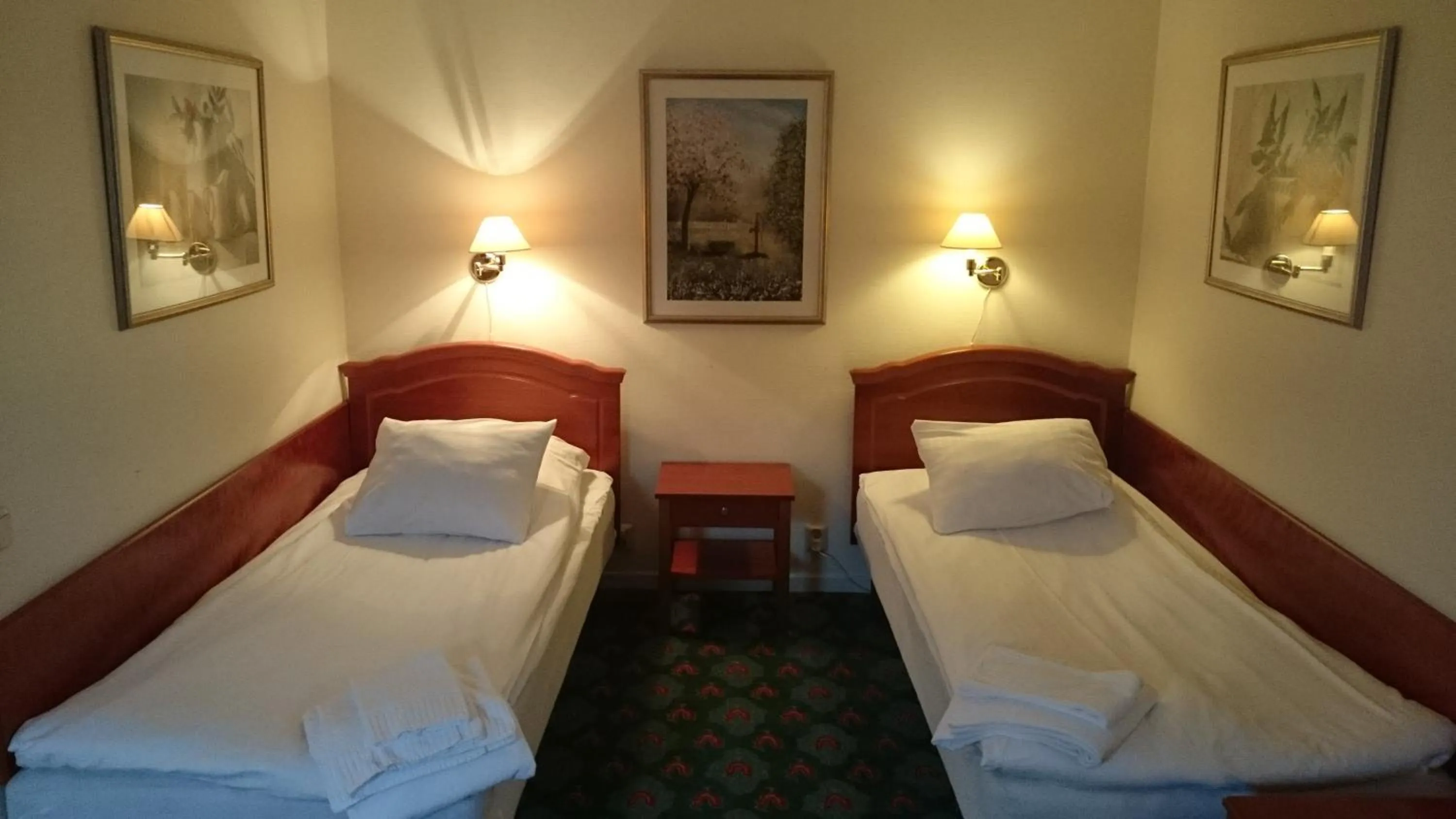 Photo of the whole room, Bed in Grand Hotell Bollnäs