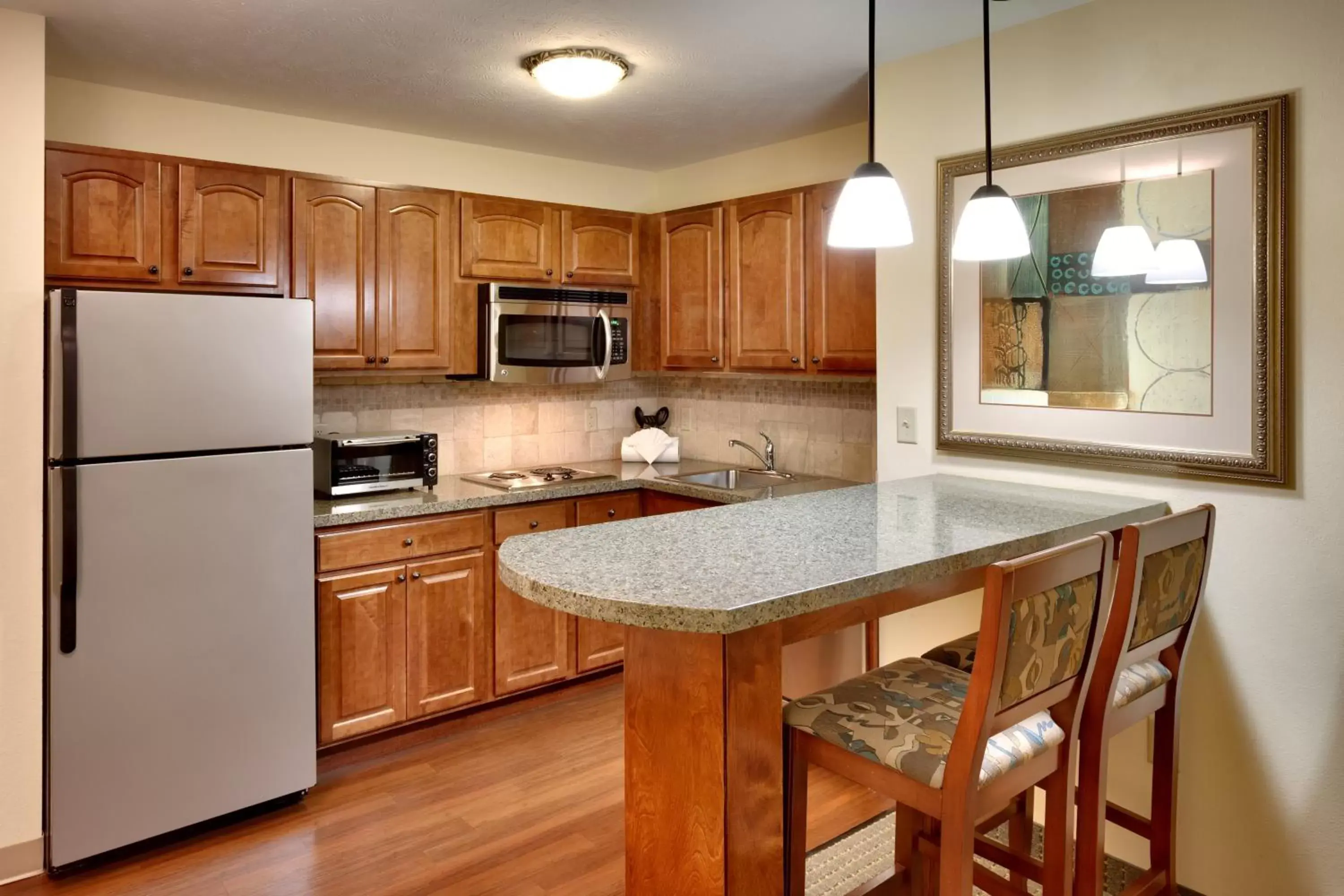 Photo of the whole room, Kitchen/Kitchenette in Staybridge Suites Omaha 80th and Dodge, an IHG Hotel