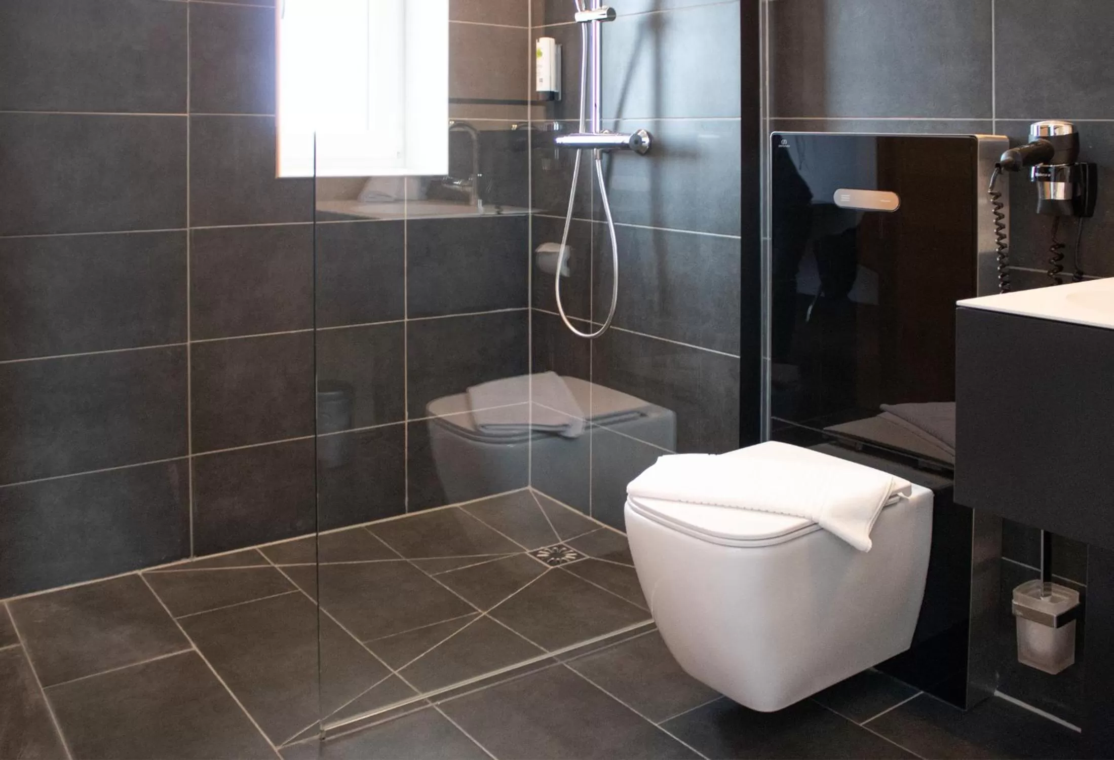 Toilet, Bathroom in RNK Hotel by WMM Hotels