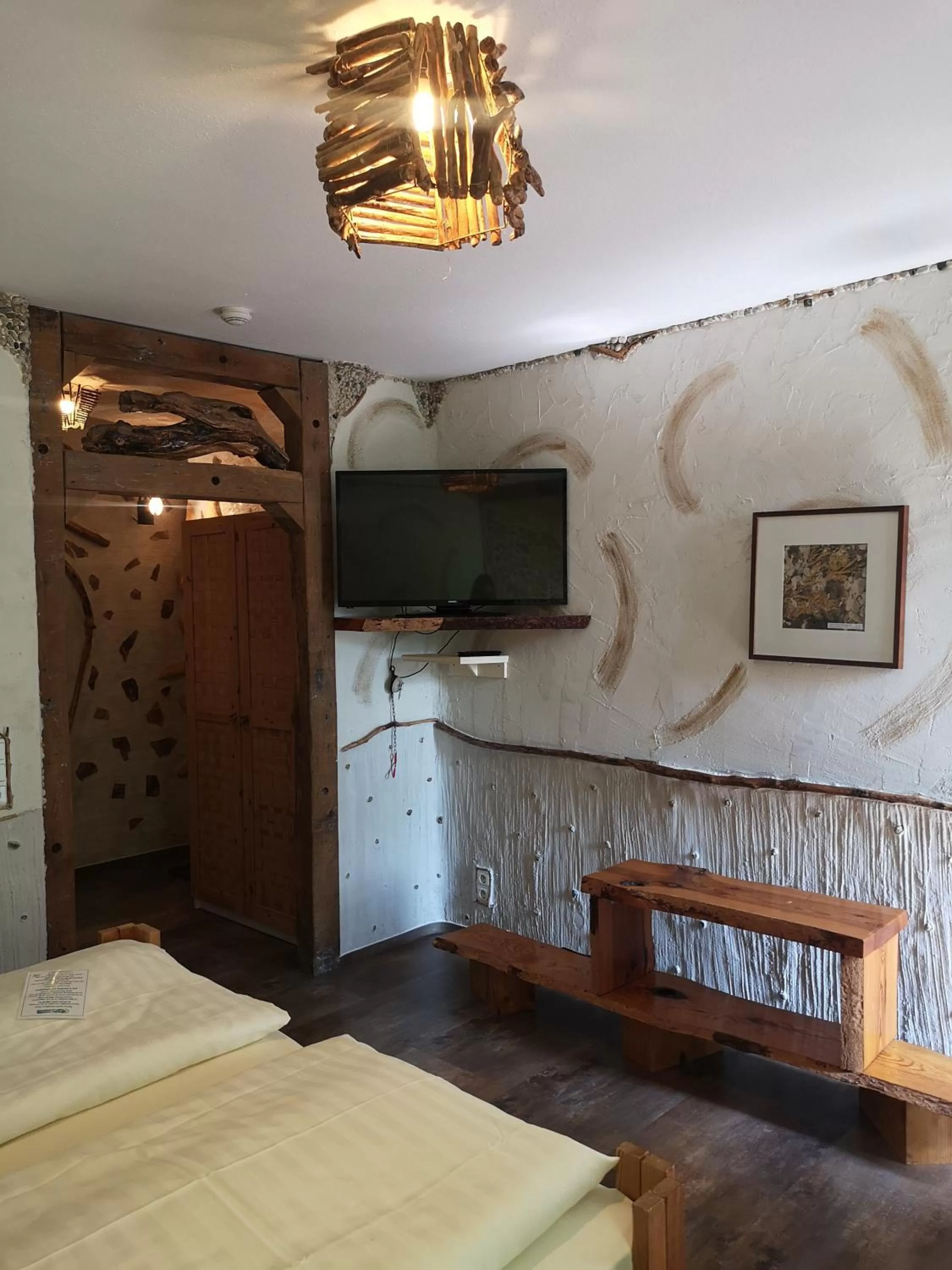 Photo of the whole room, Bed in Hotel Goldflair am Rathaus