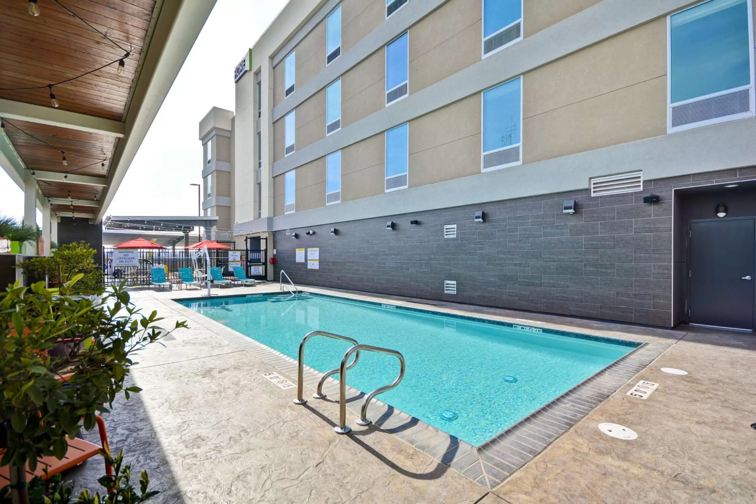 Pool view in Home2 Suites By Hilton Hanford Lemoore