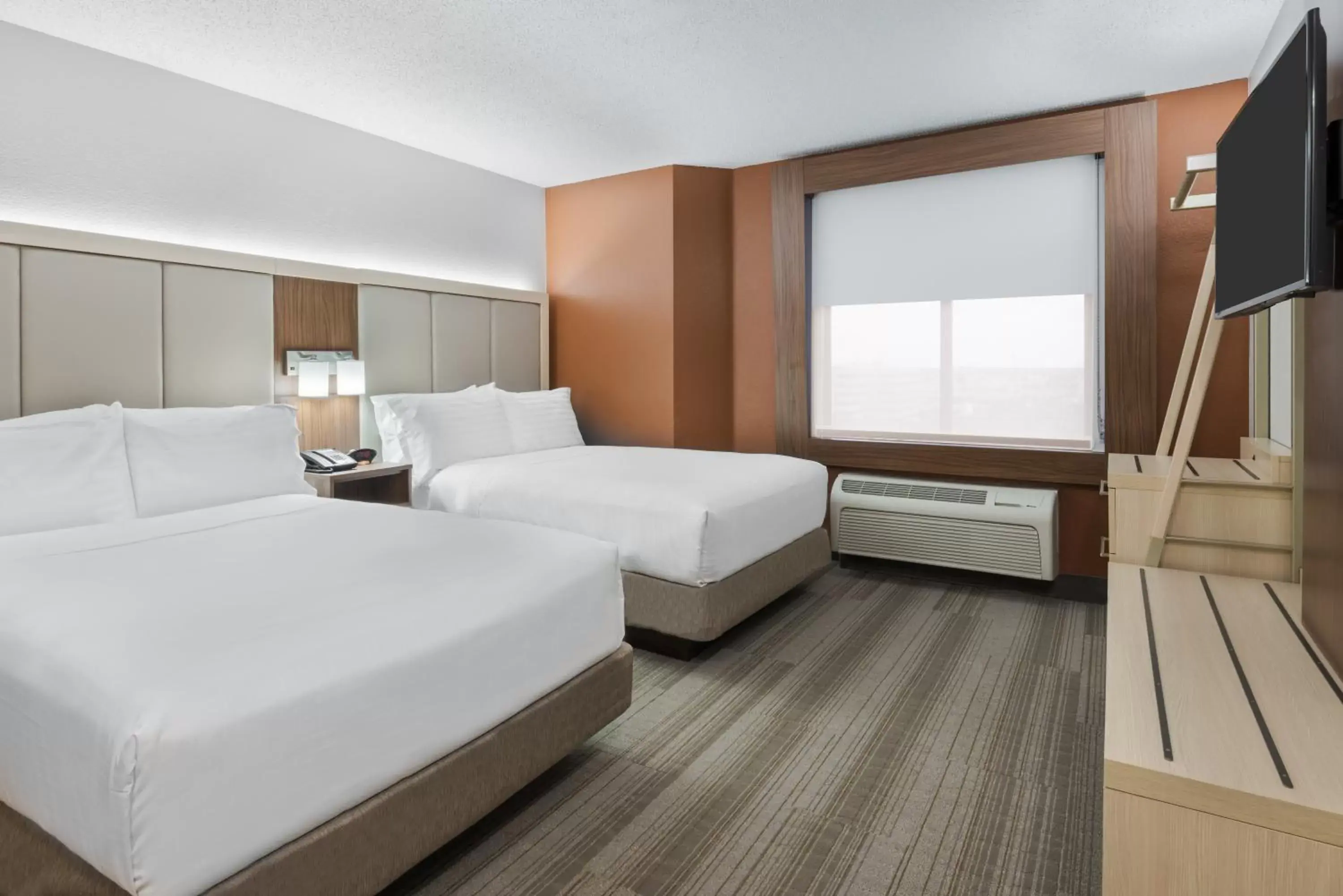 Photo of the whole room, Bed in Holiday Inn Express & Suites - Nearest Universal Orlando, an IHG Hotel