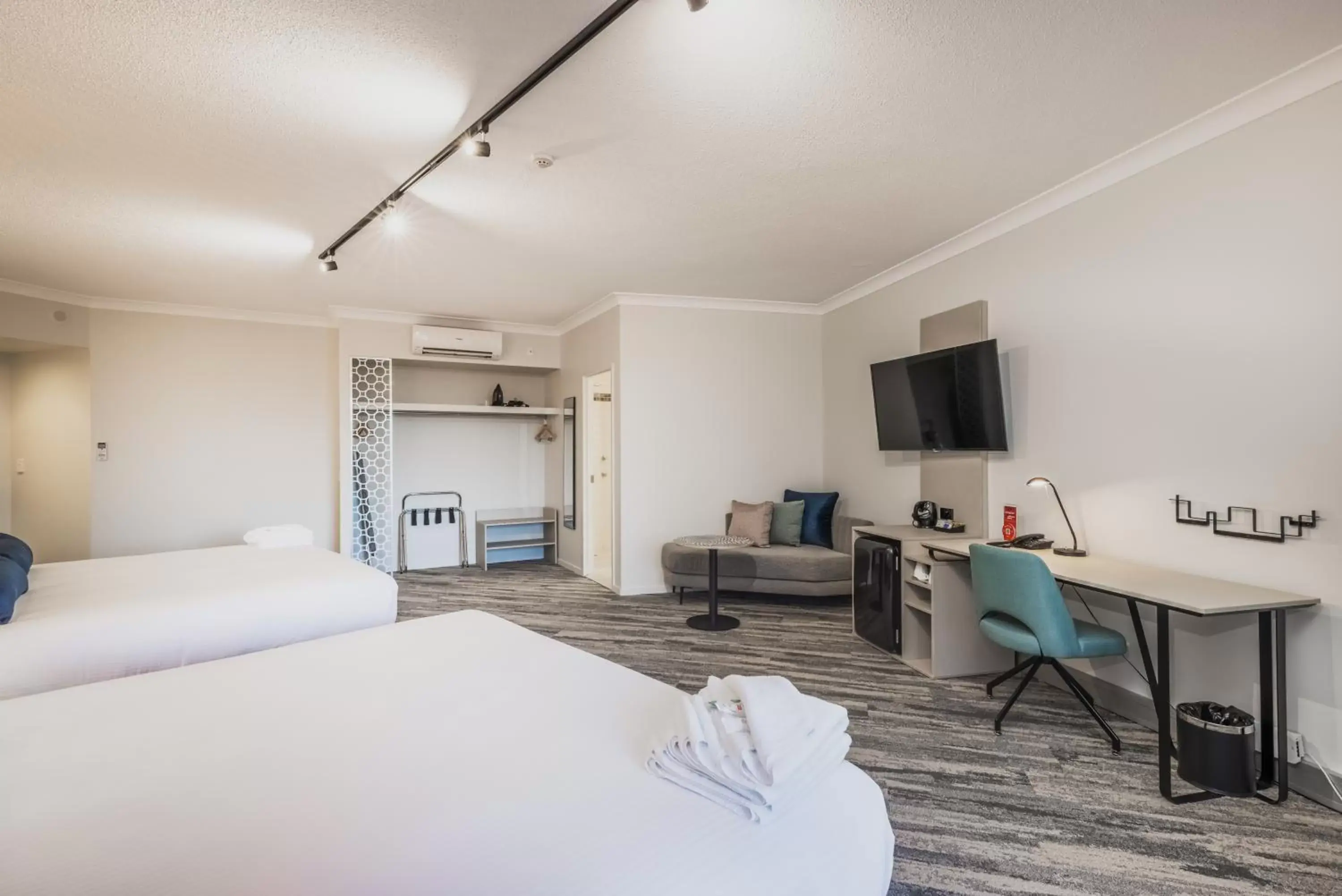 Bedroom, TV/Entertainment Center in Mermaid Waters Hotel by Nightcap Plus