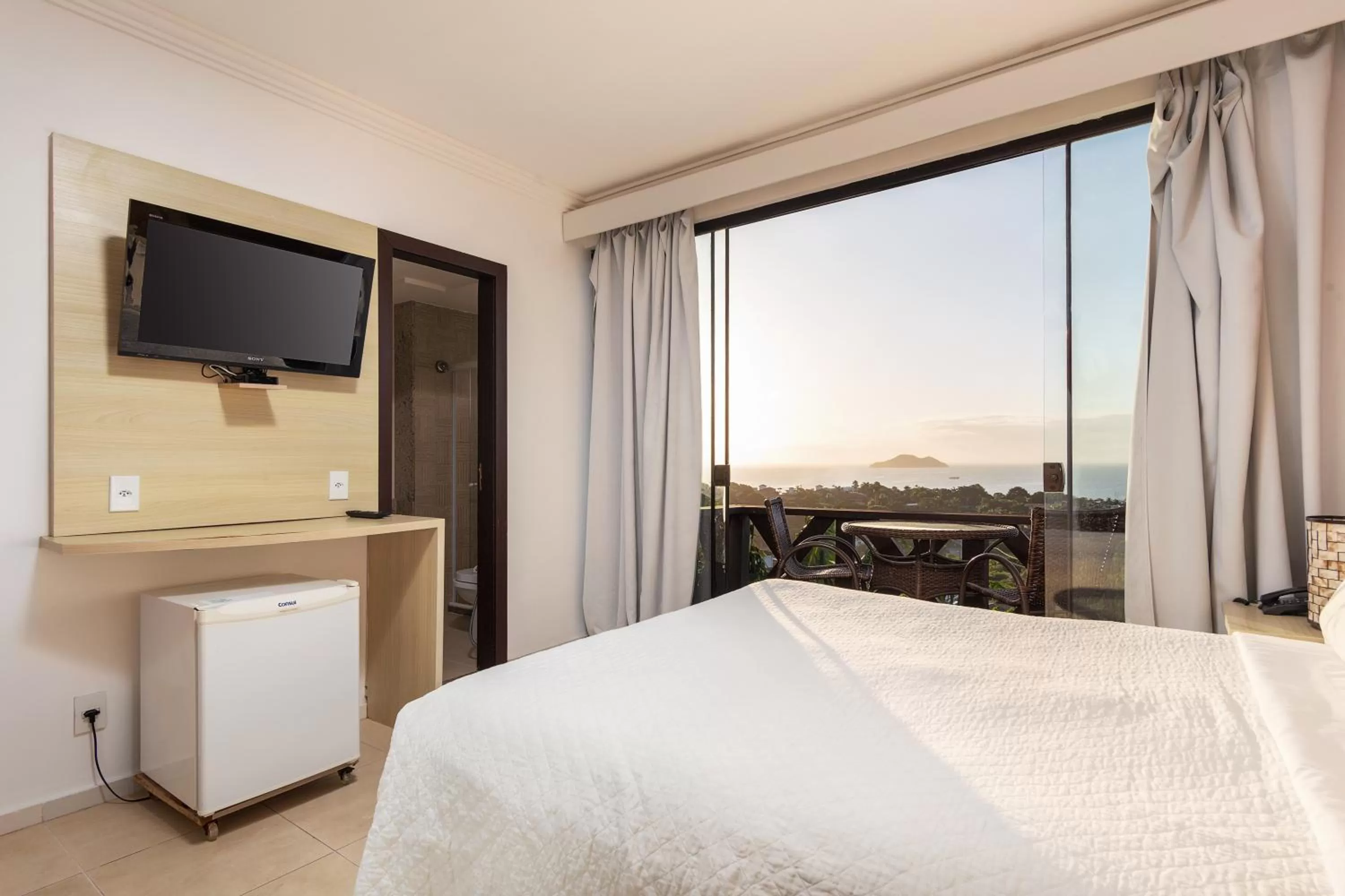 Photo of the whole room, Bed in Costa do Sol Boutique Hotel