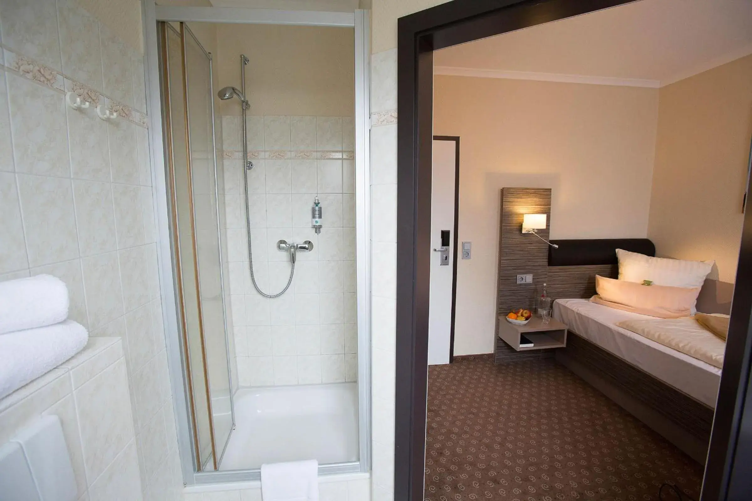 Bed, Bathroom in City Hotel