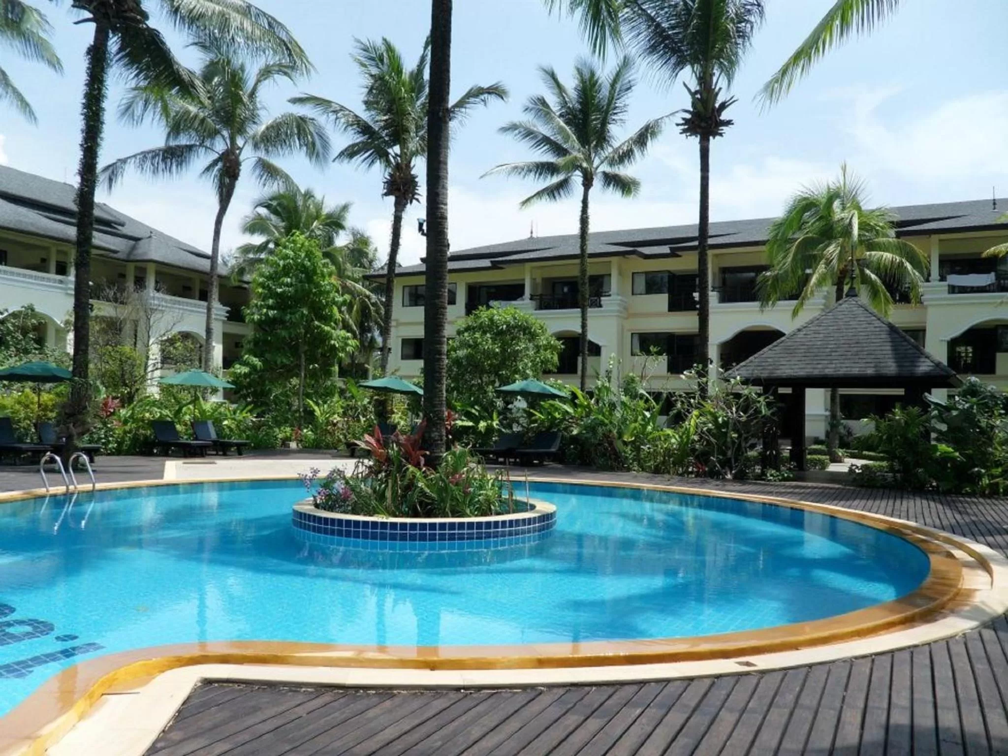 Swimming pool in Khaolak Orchid Beach Resort - SHA Extra Plus