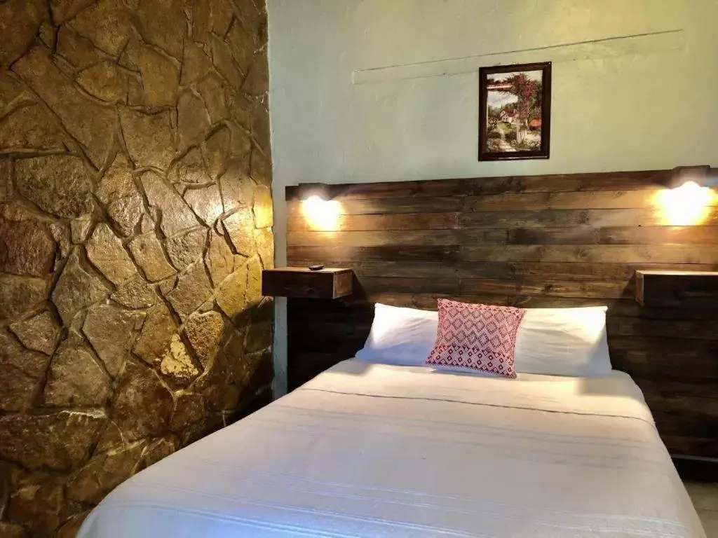 Bed in Arte Sano Hotel San Cristobal