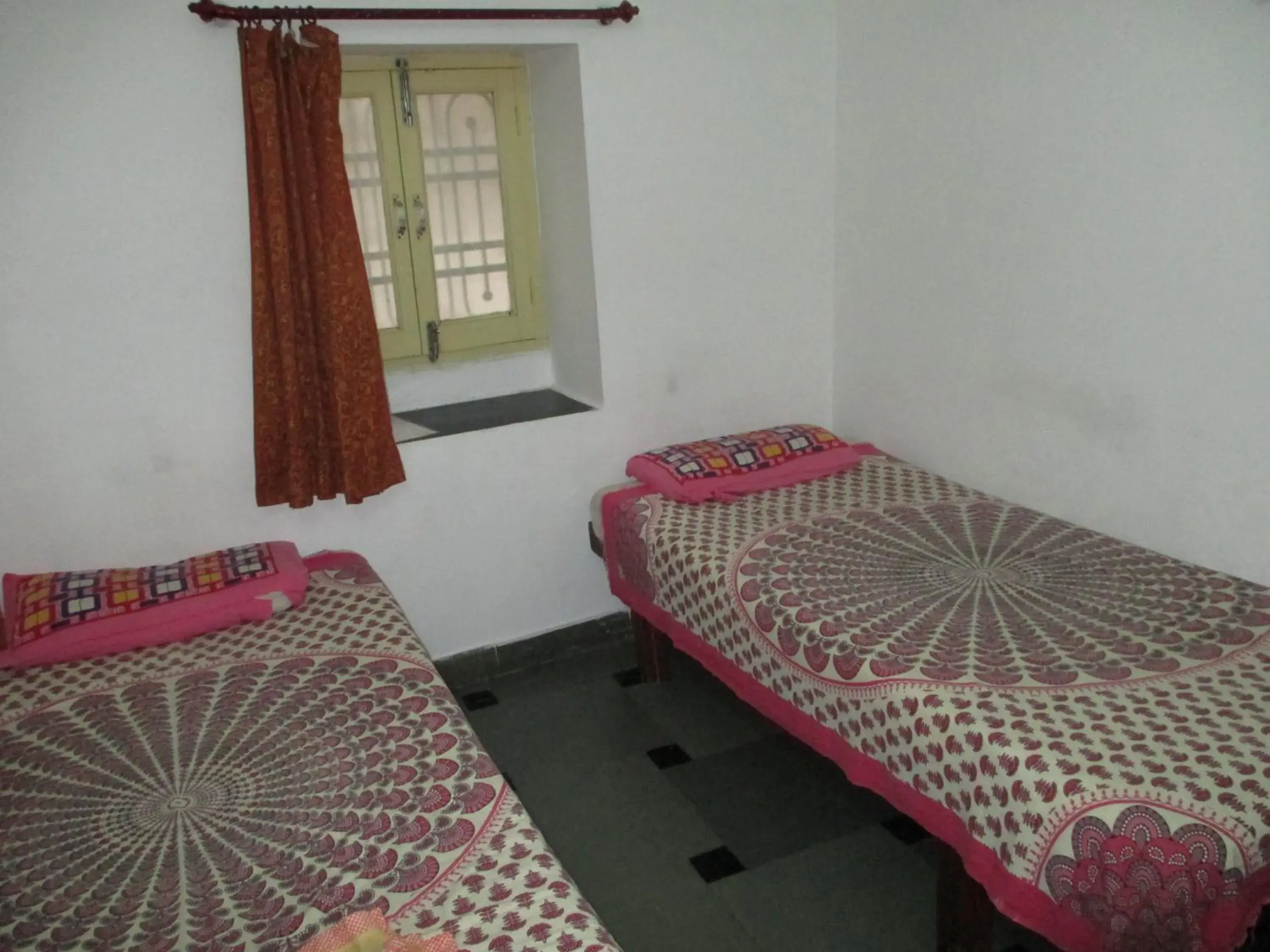 Bed in Udai Haveli Guest House Bed in Udai Haveli Guest House