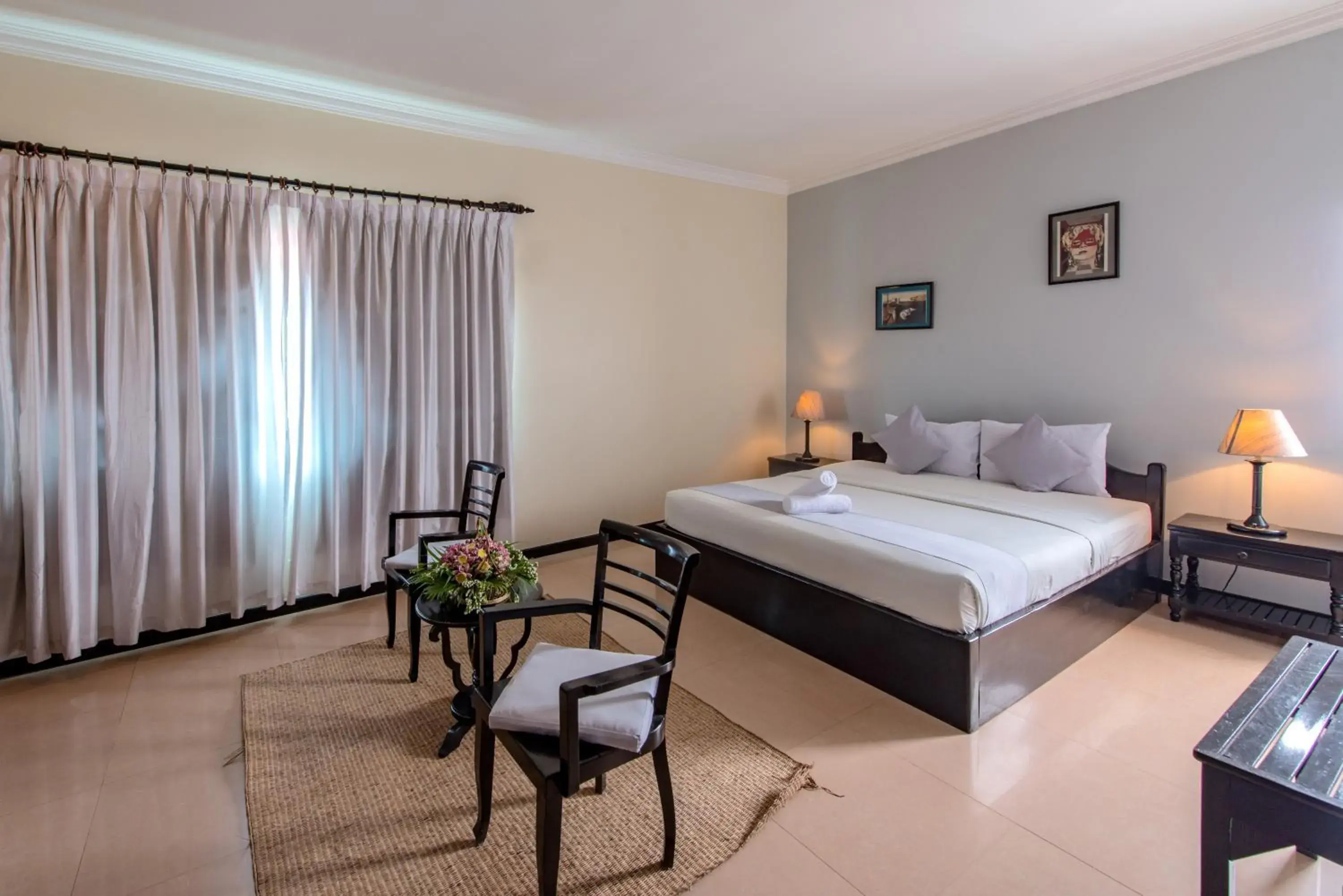 Photo of the whole room, Bed in Angkor Panoramic Boutique Hotel