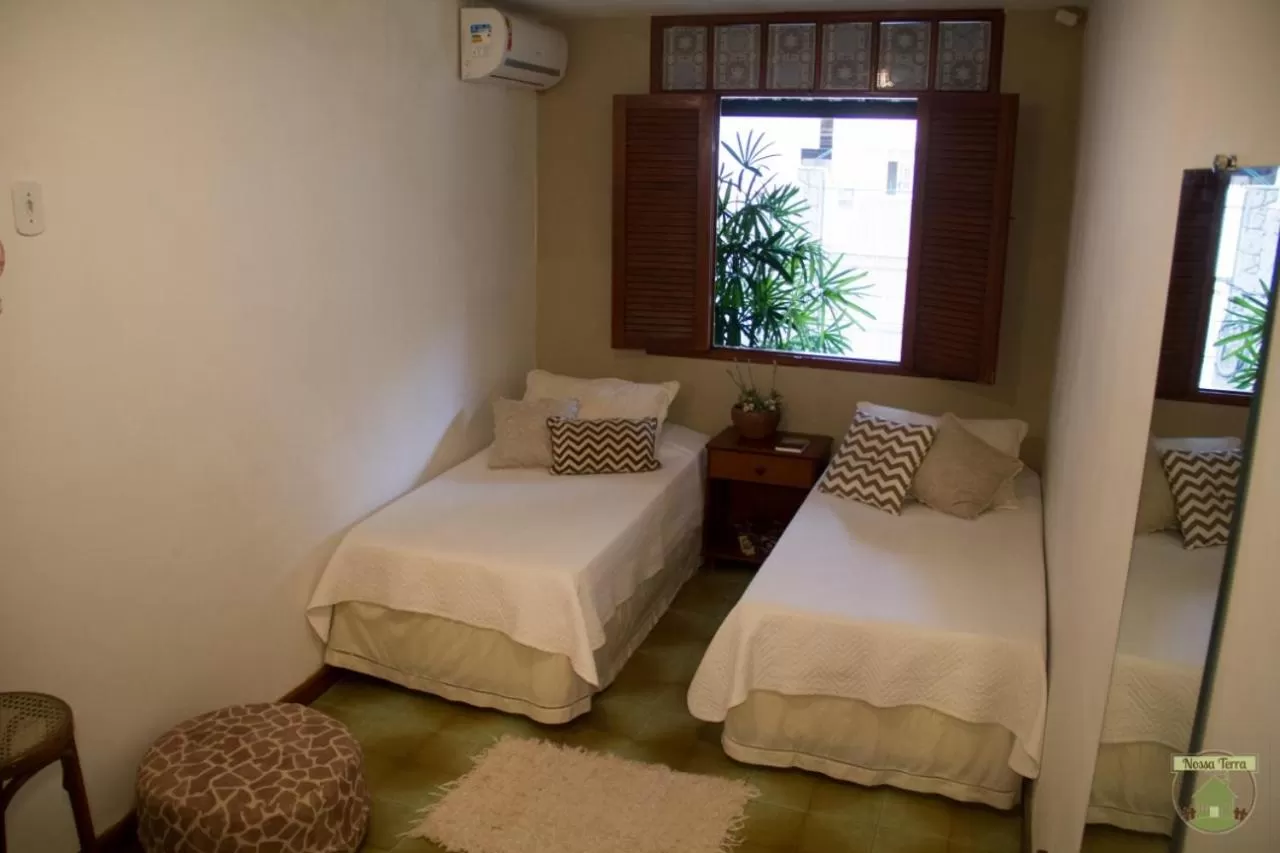 Bed in Pousada Nossa Terra