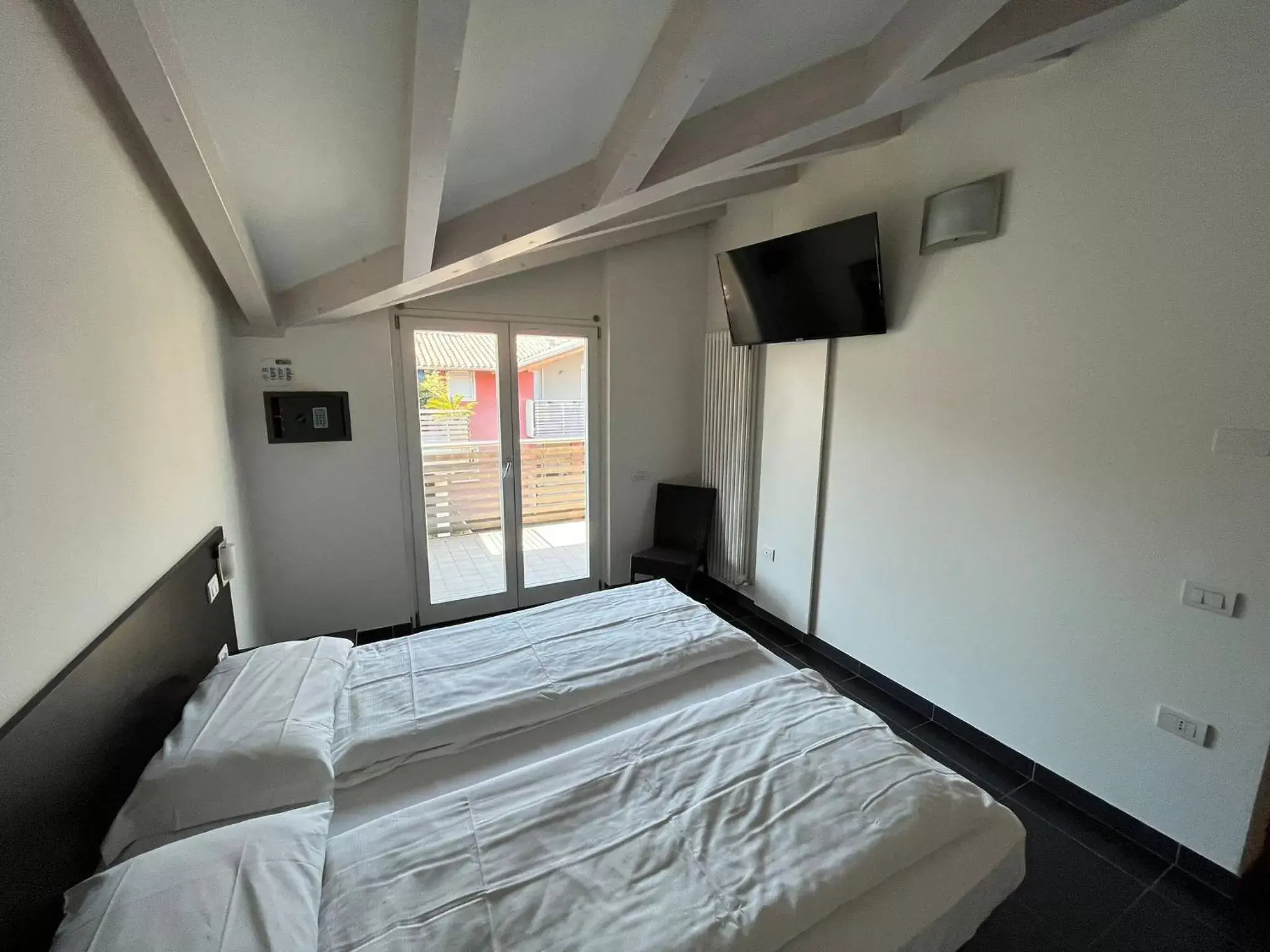 Bed in 4 Limoni Apartment Resort