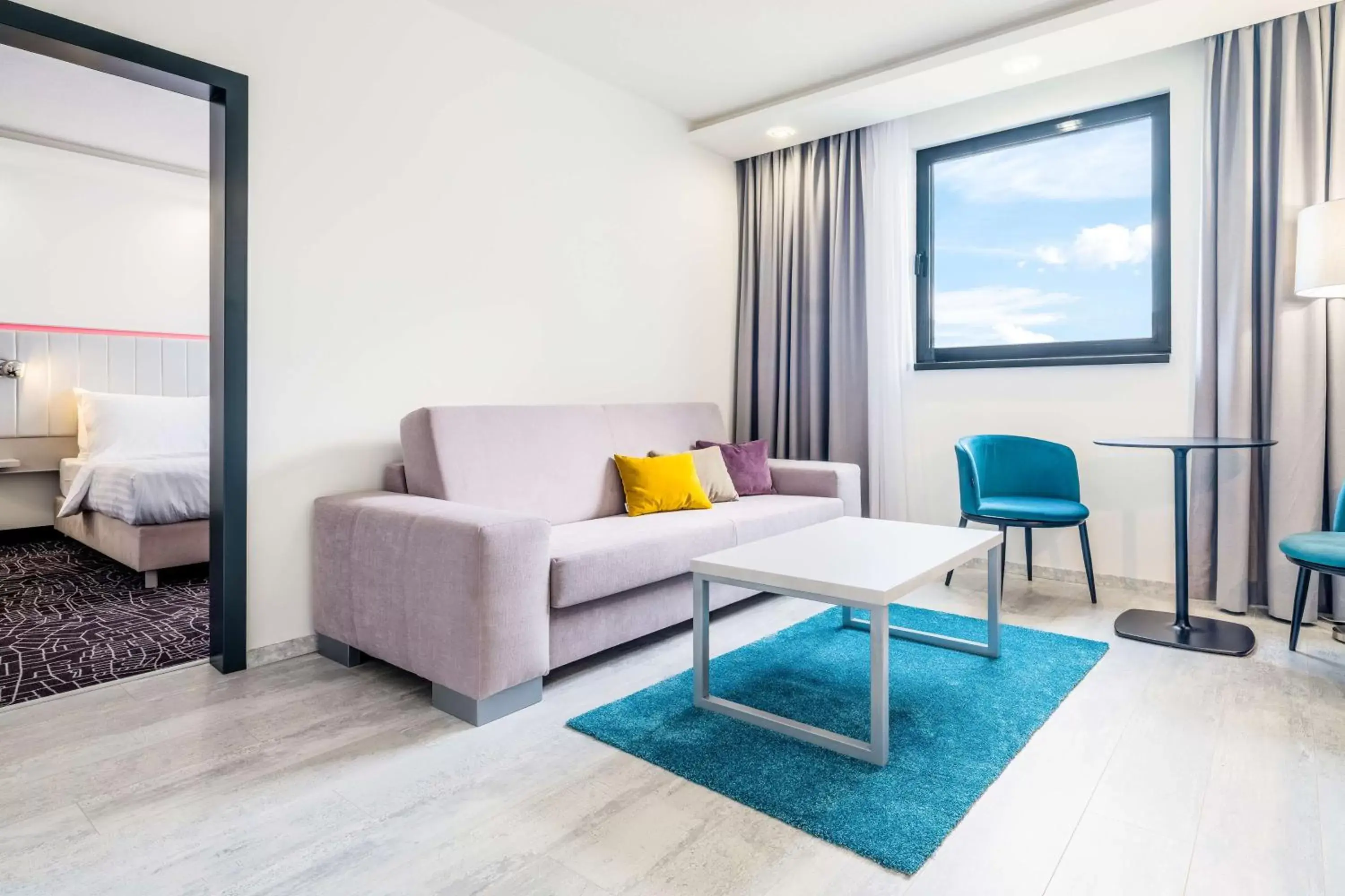 Living room, Bed in Park Inn by Radisson Danube Bratislava Living room, Bed in Park Inn by Radisson Danube Bratislava