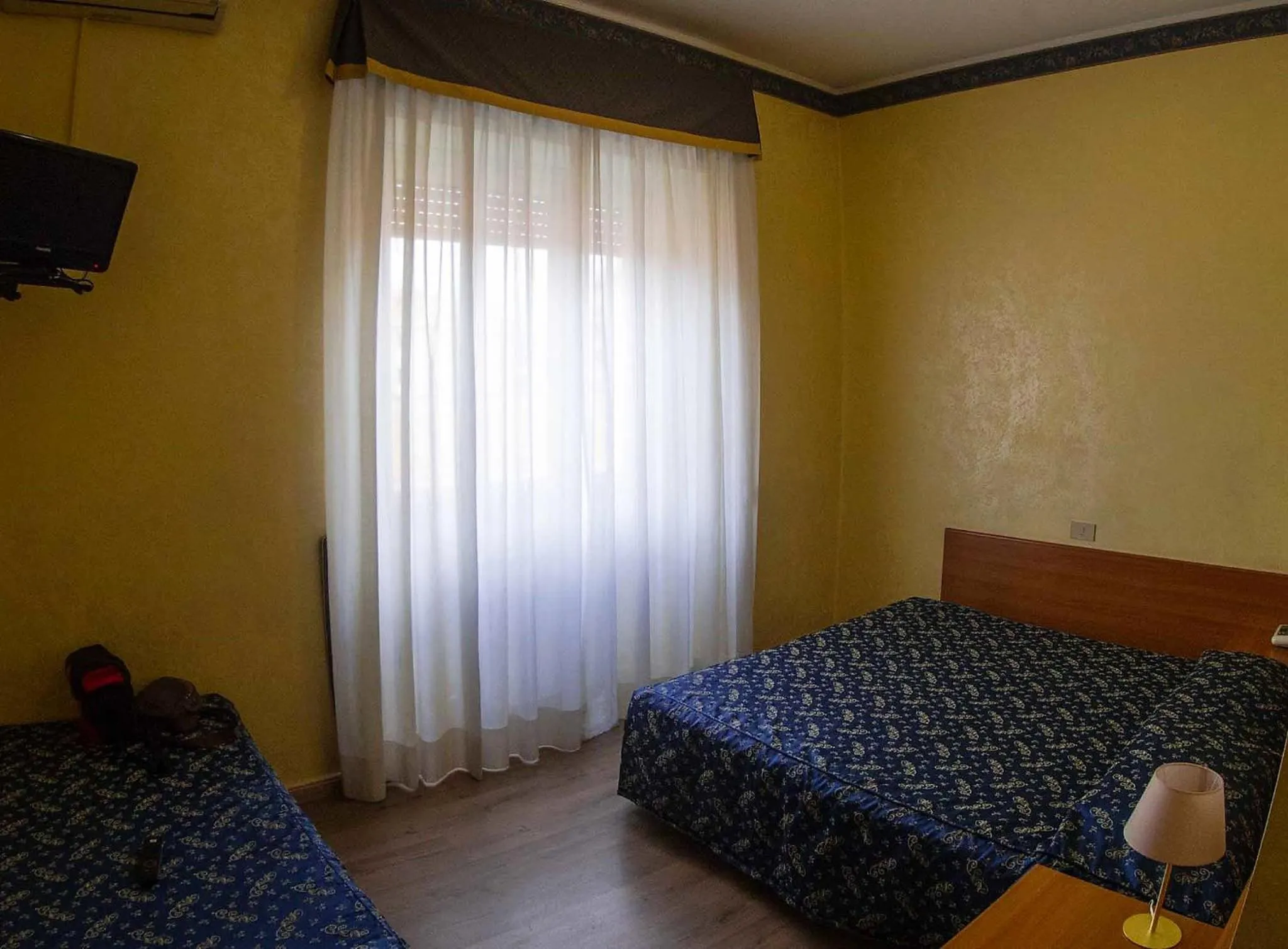 Bed in Albergo Dei Leoni