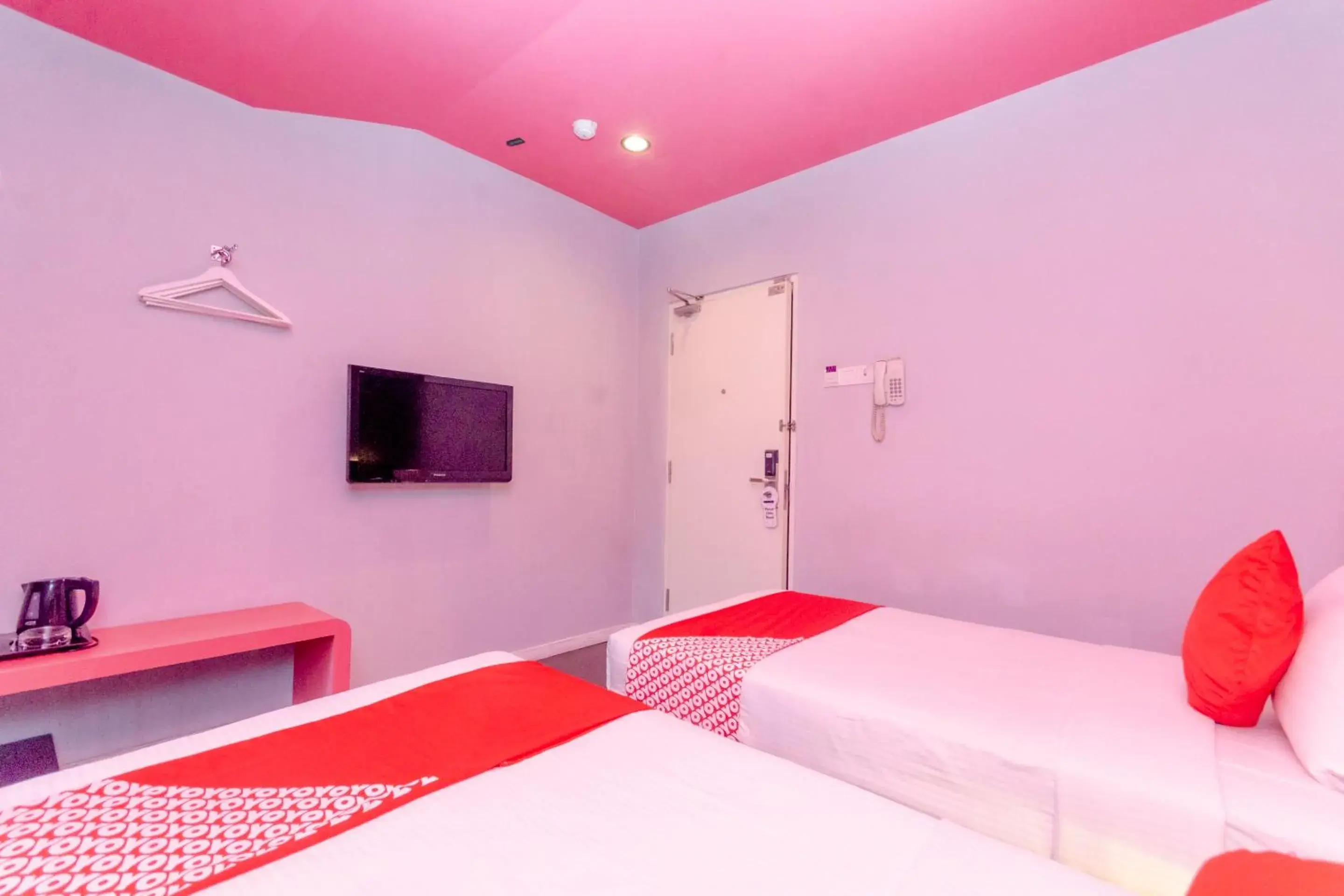 Bedroom, Bed in OYO 902 Rooms Boutique Hotel