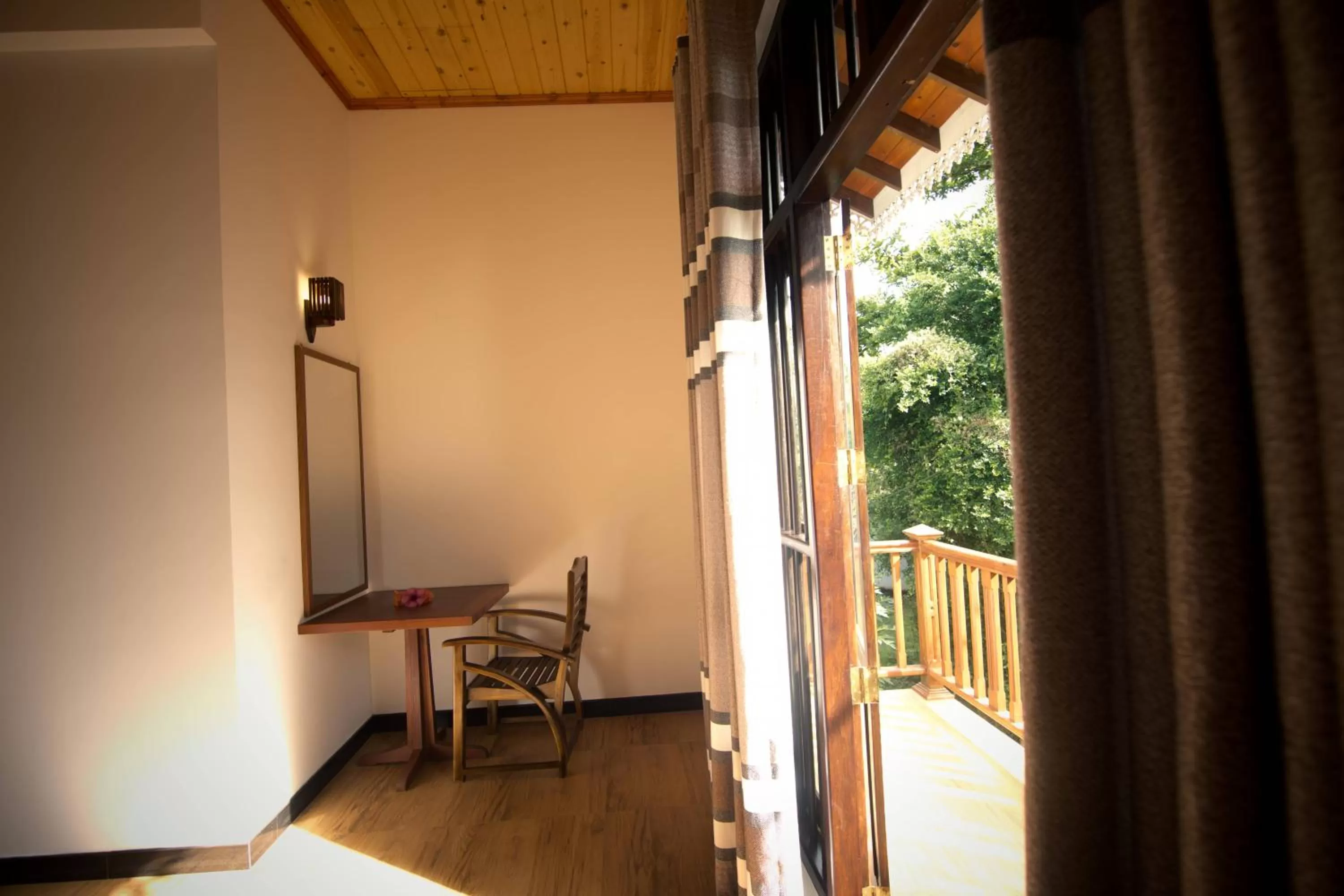 Living room, Balcony/Terrace in Ashiyana Hotel