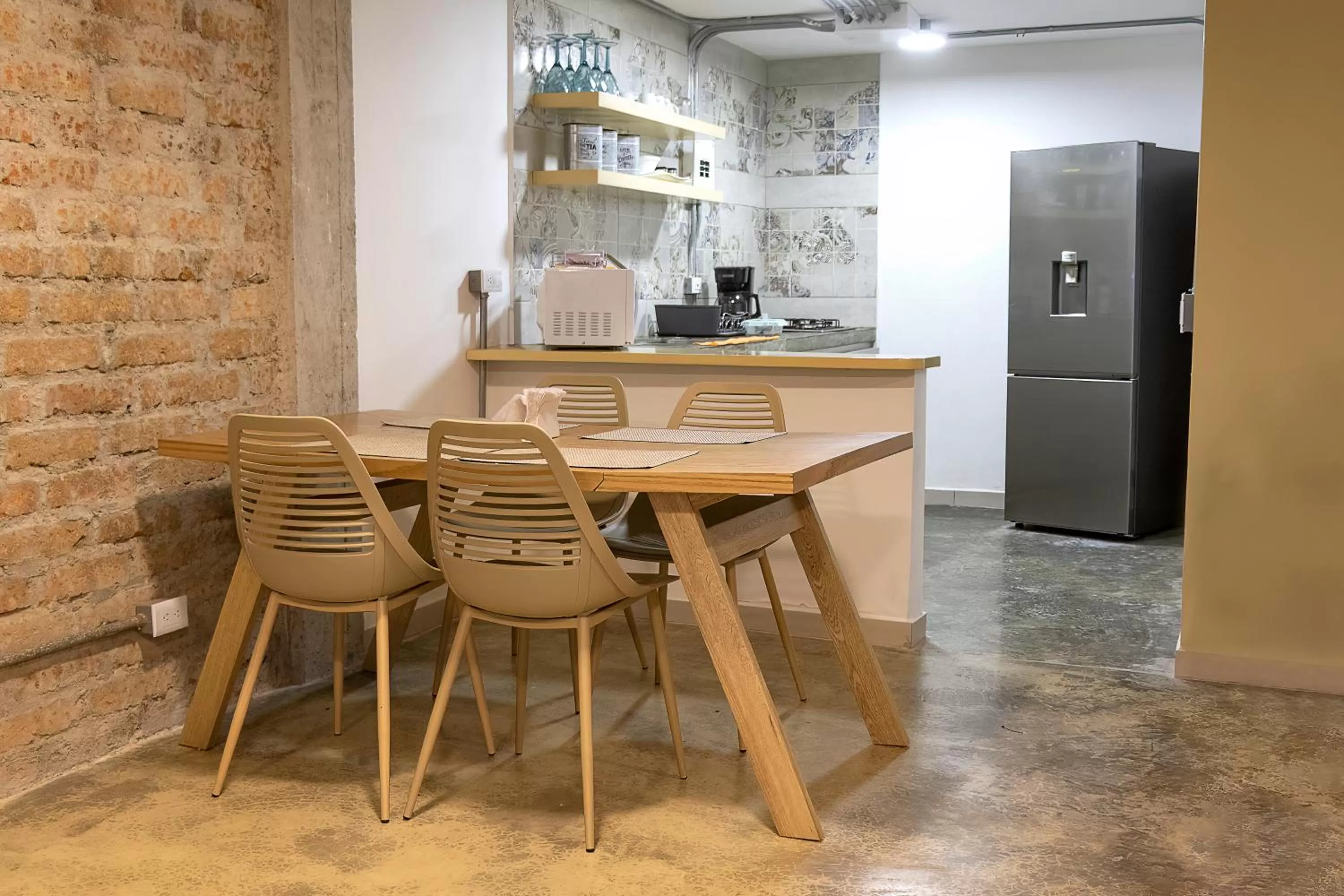 Kitchen or kitchenette in Ventiuna Hotel y Coliving