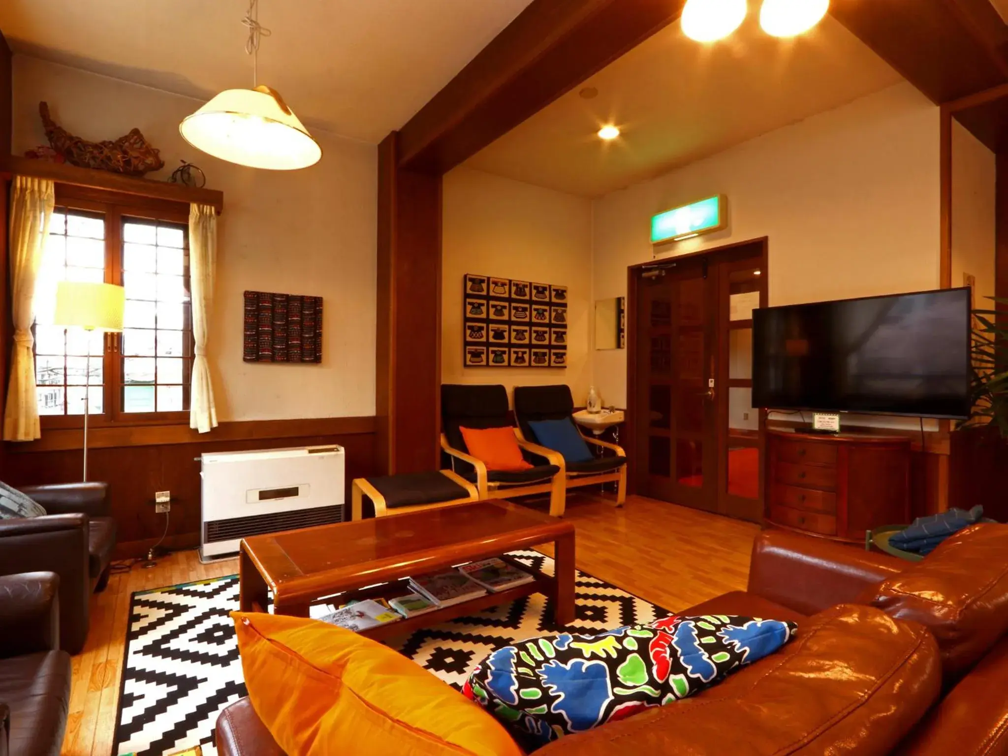 Communal lounge/ TV room in Belle Vue Nishiura