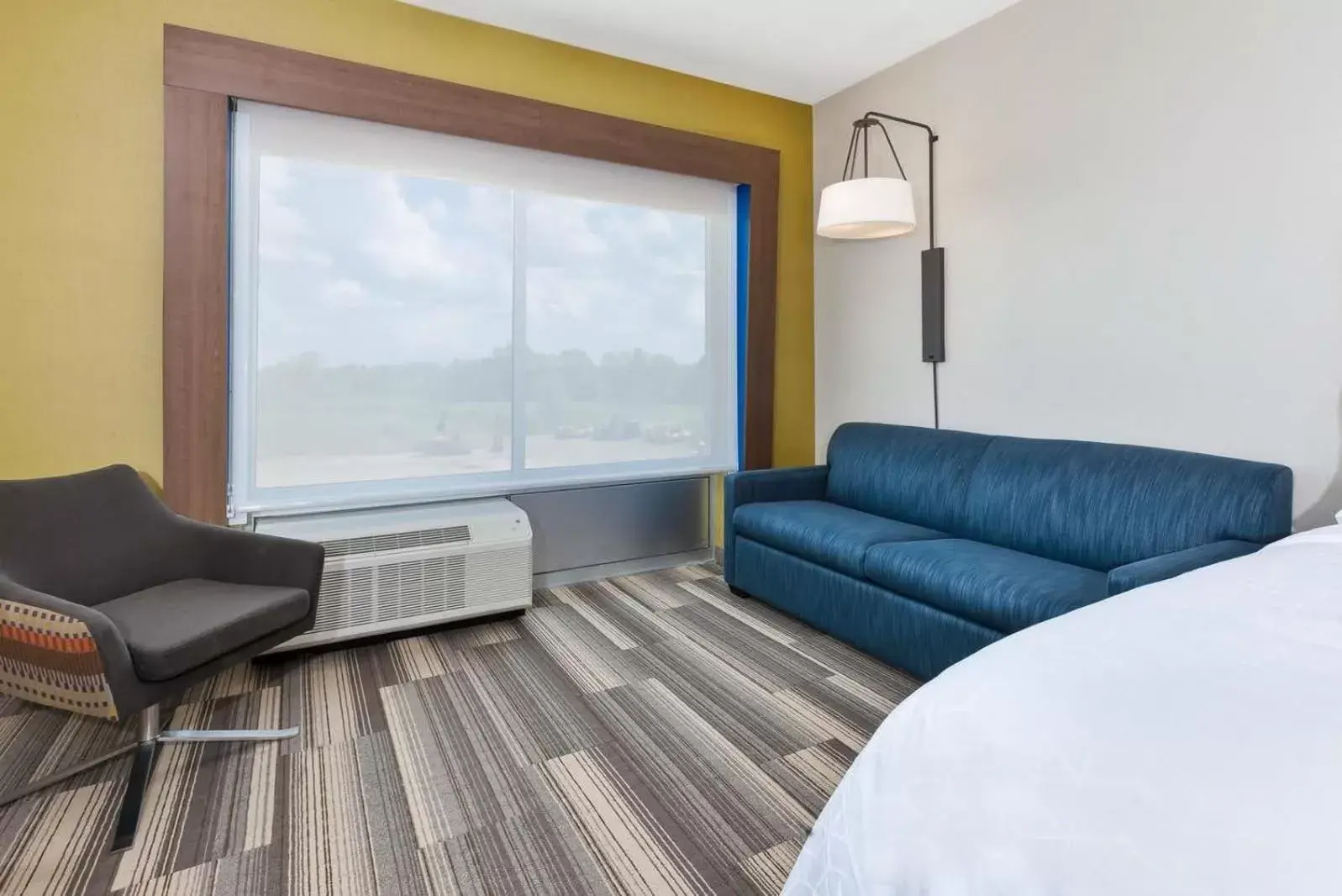 Seating Area in Holiday Inn Express & Suites - Grand Rapids Airport - South, an IHG Hotel