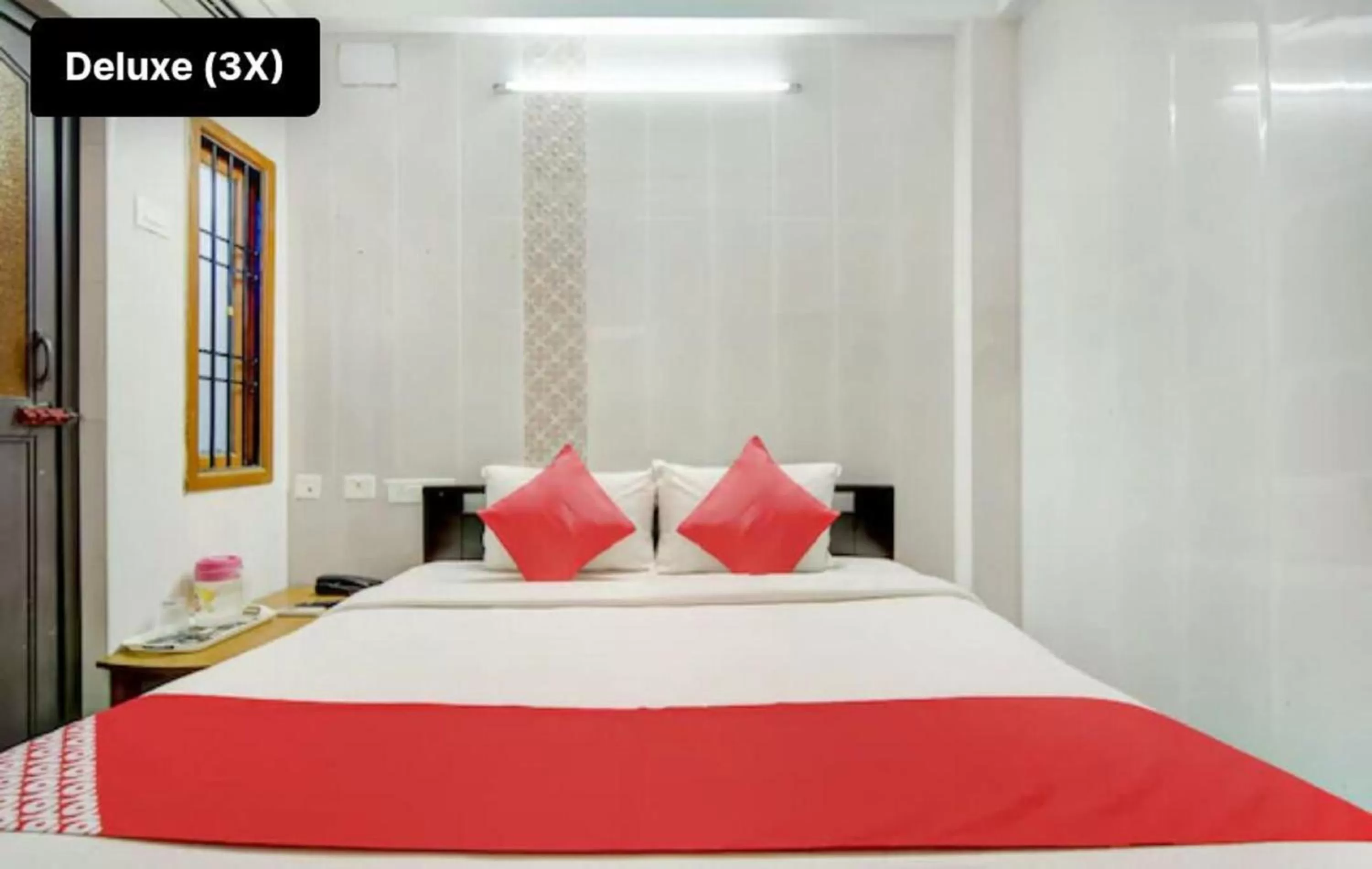 Bed in Silver Cloud Hotel Sholinganallur