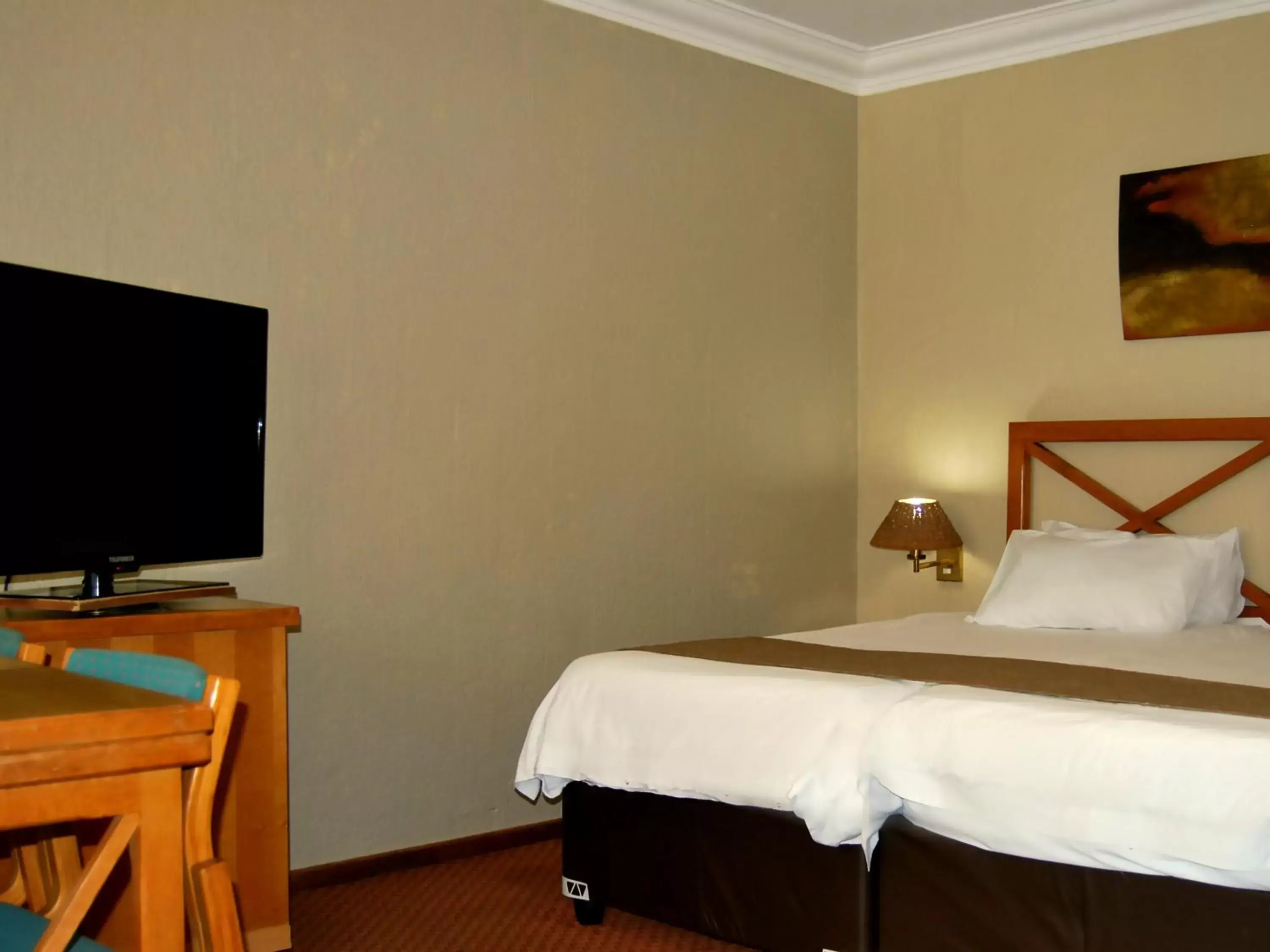 Bed in Safari Hotel & Convention Centre