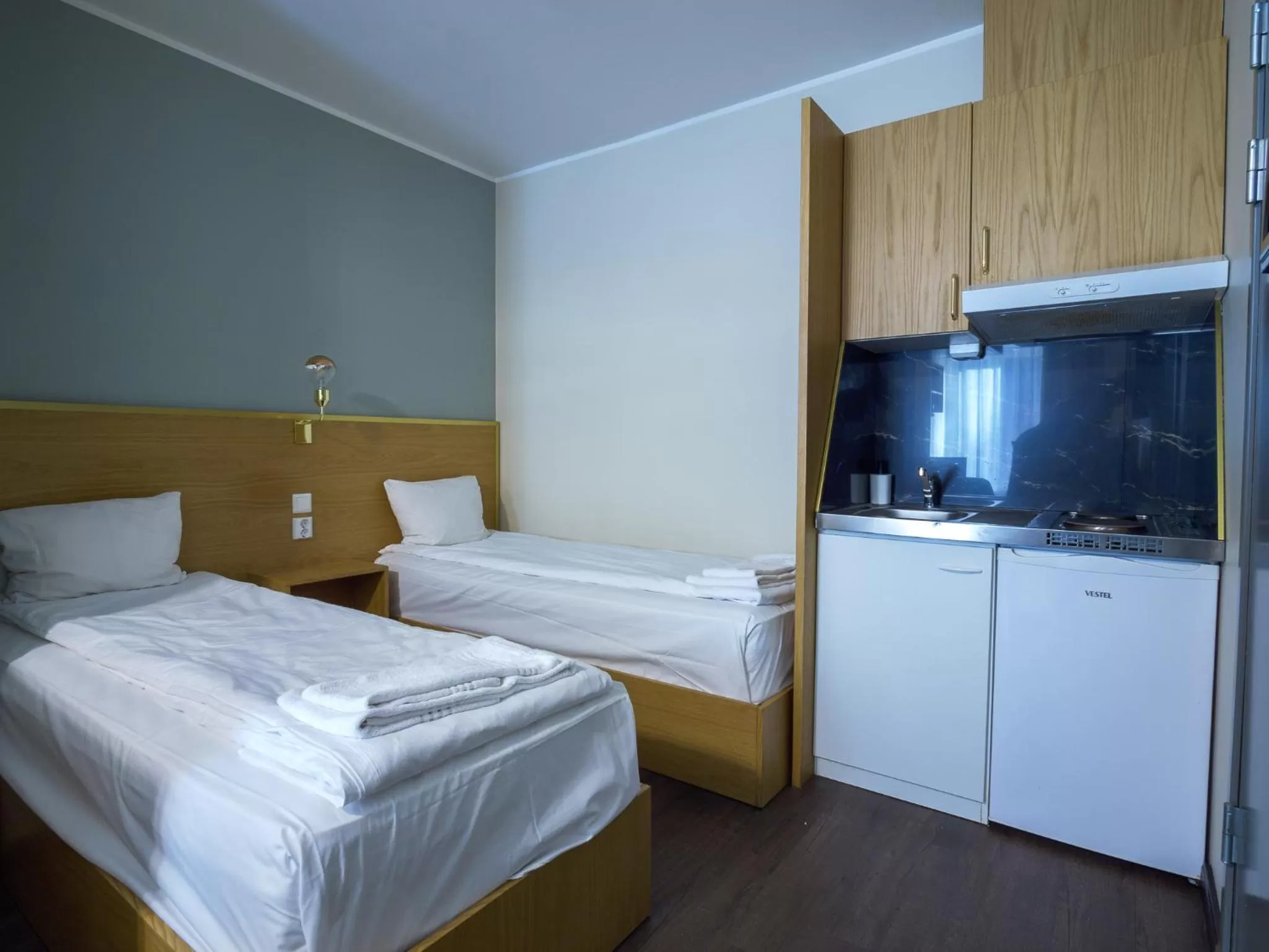 Bed in Central City Apartments