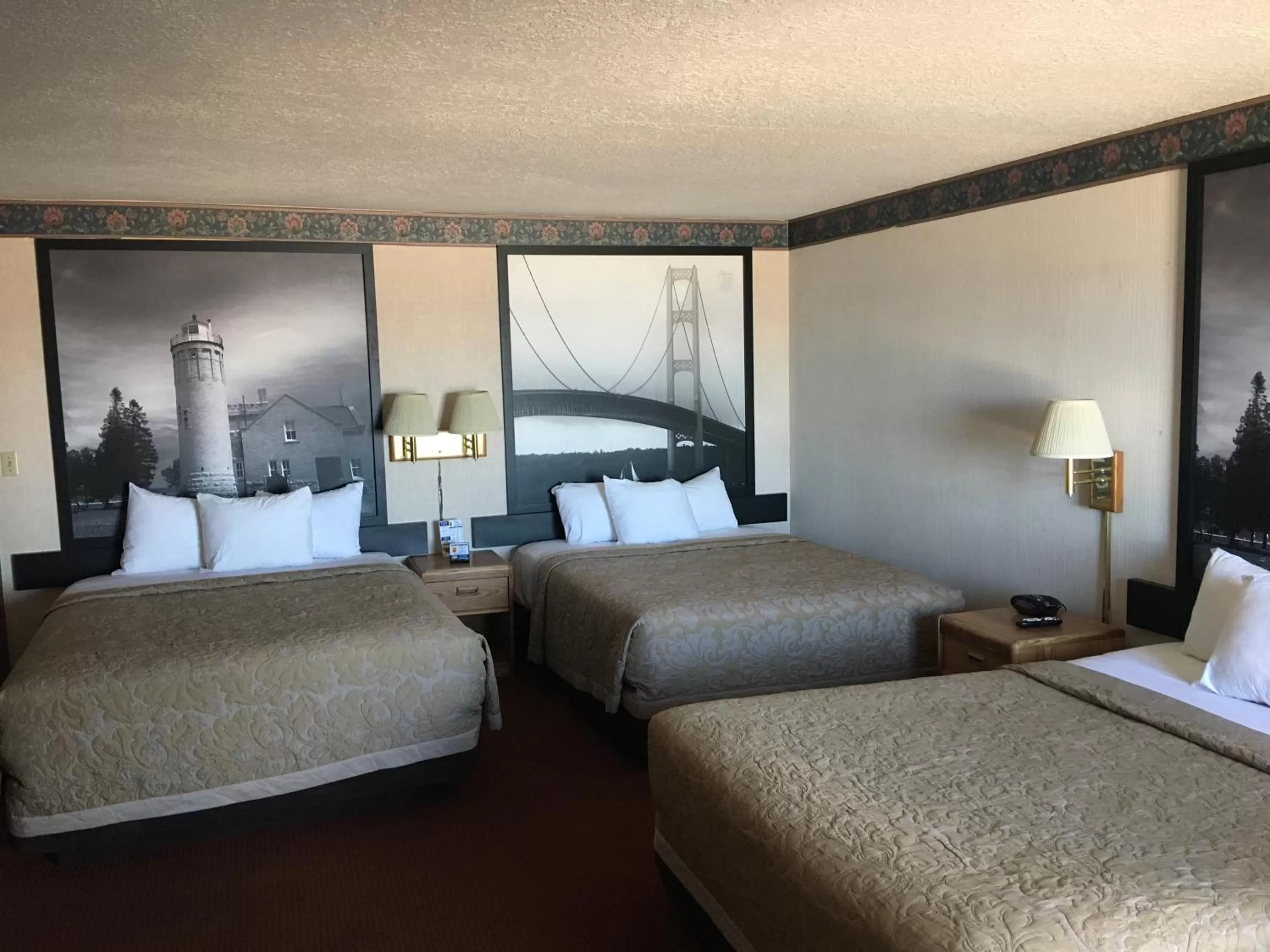 Photo of the whole room, Bed in Super 8 Beachfront by Wyndham Mackinaw City, MI