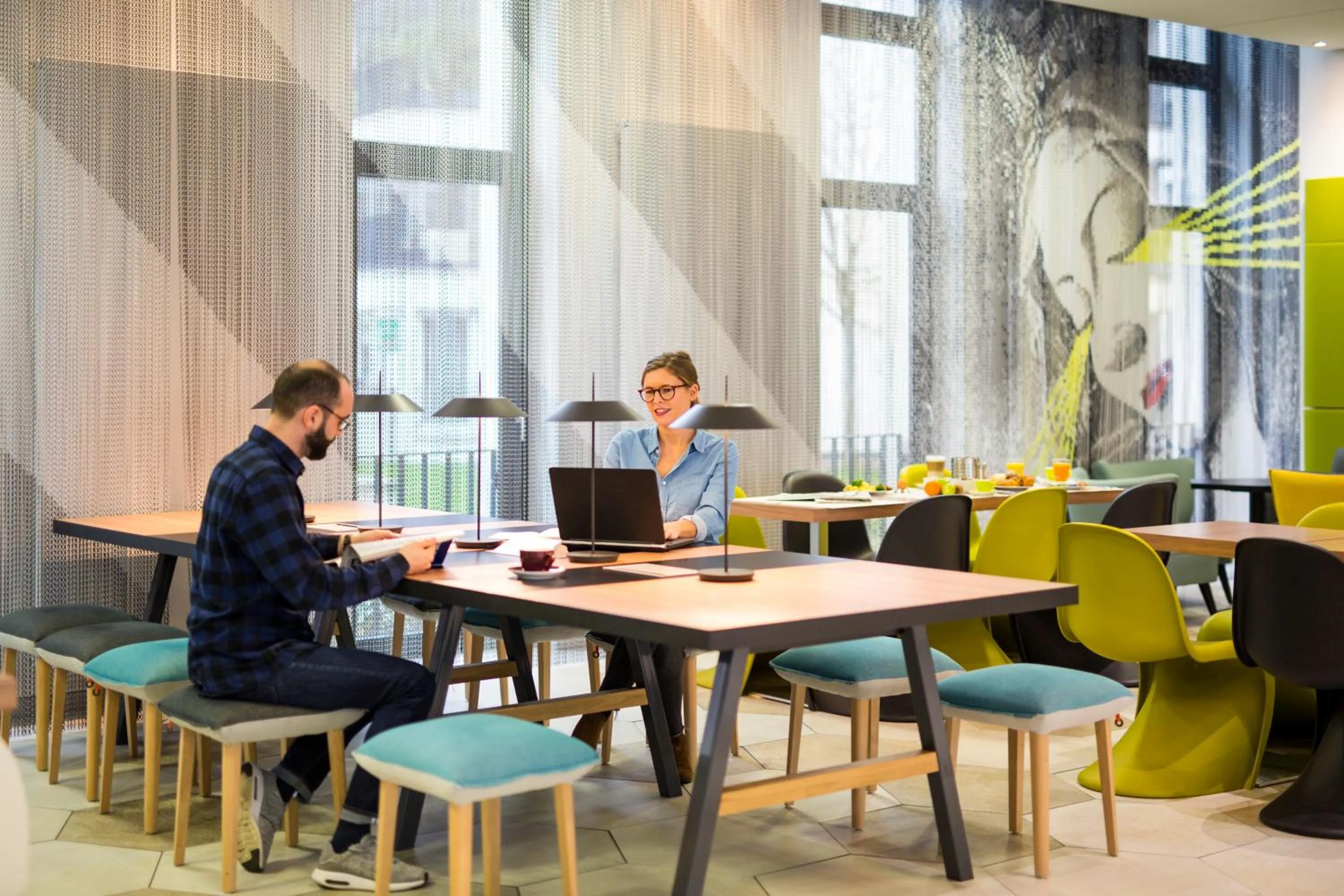 Communal lounge/ TV room in Aparthotel Adagio Köln City