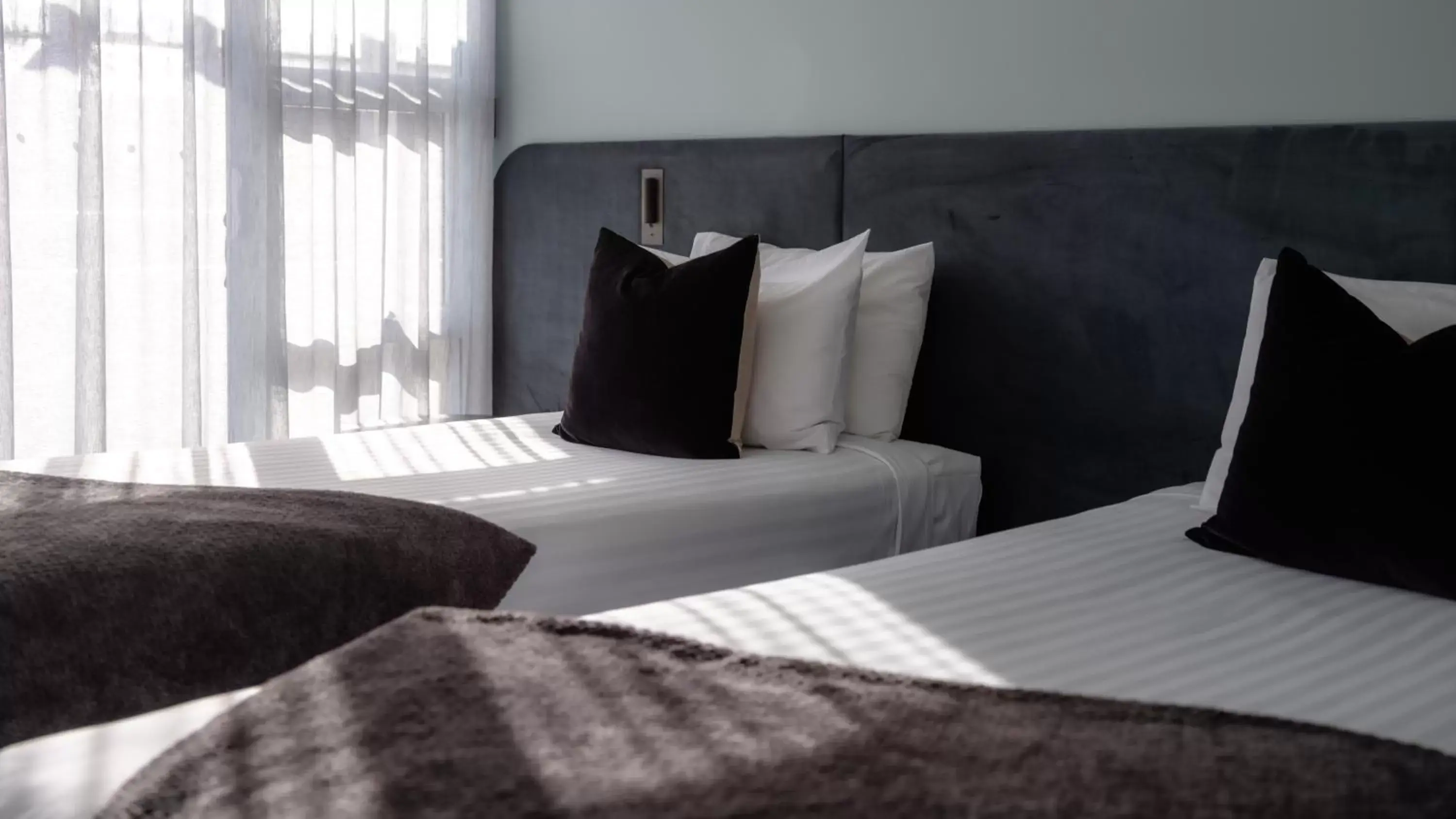 Bed in Salamanca Suites