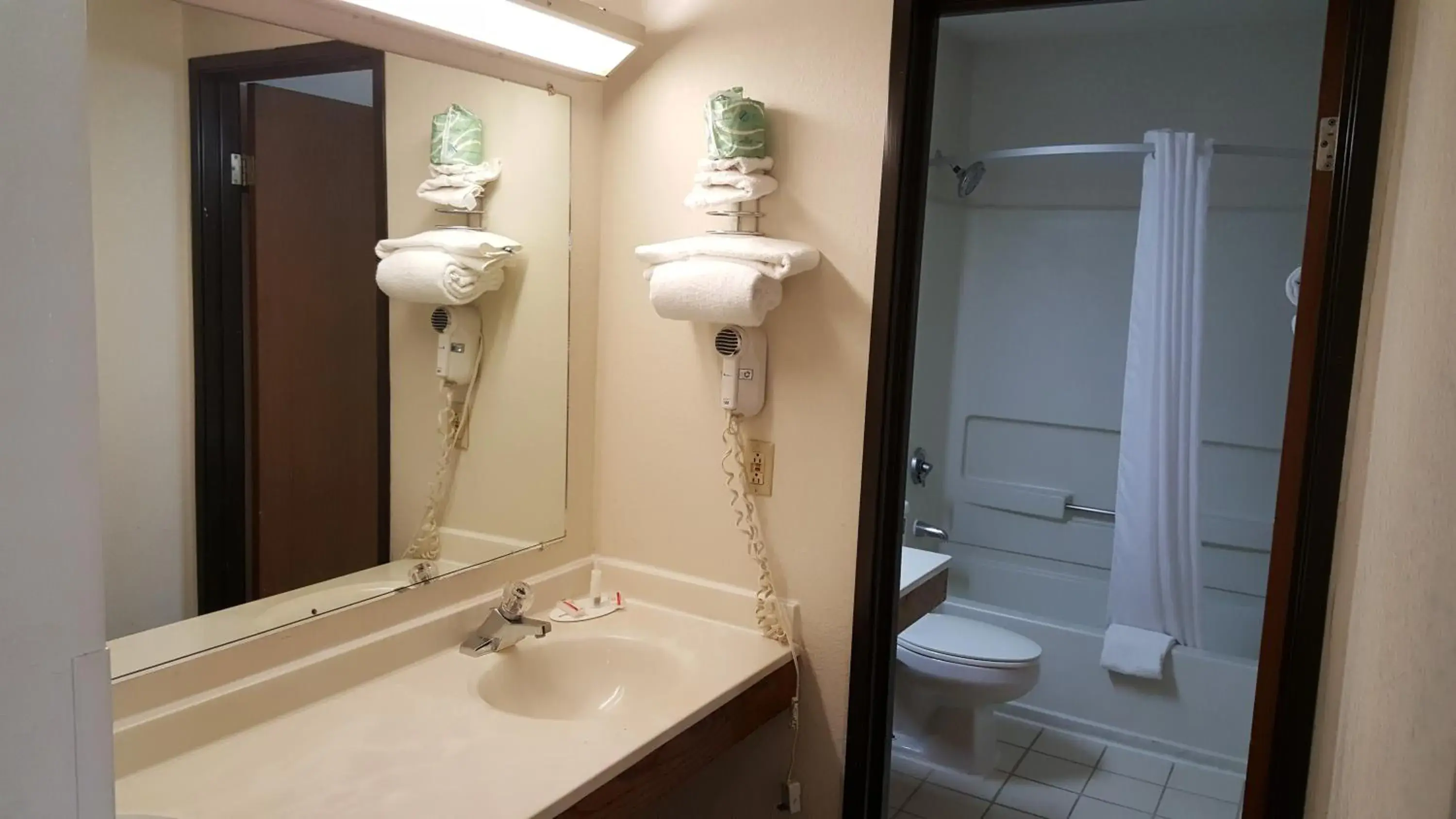 Bathroom in Super 8 by Wyndham Greensboro/Coliseum/Conv.