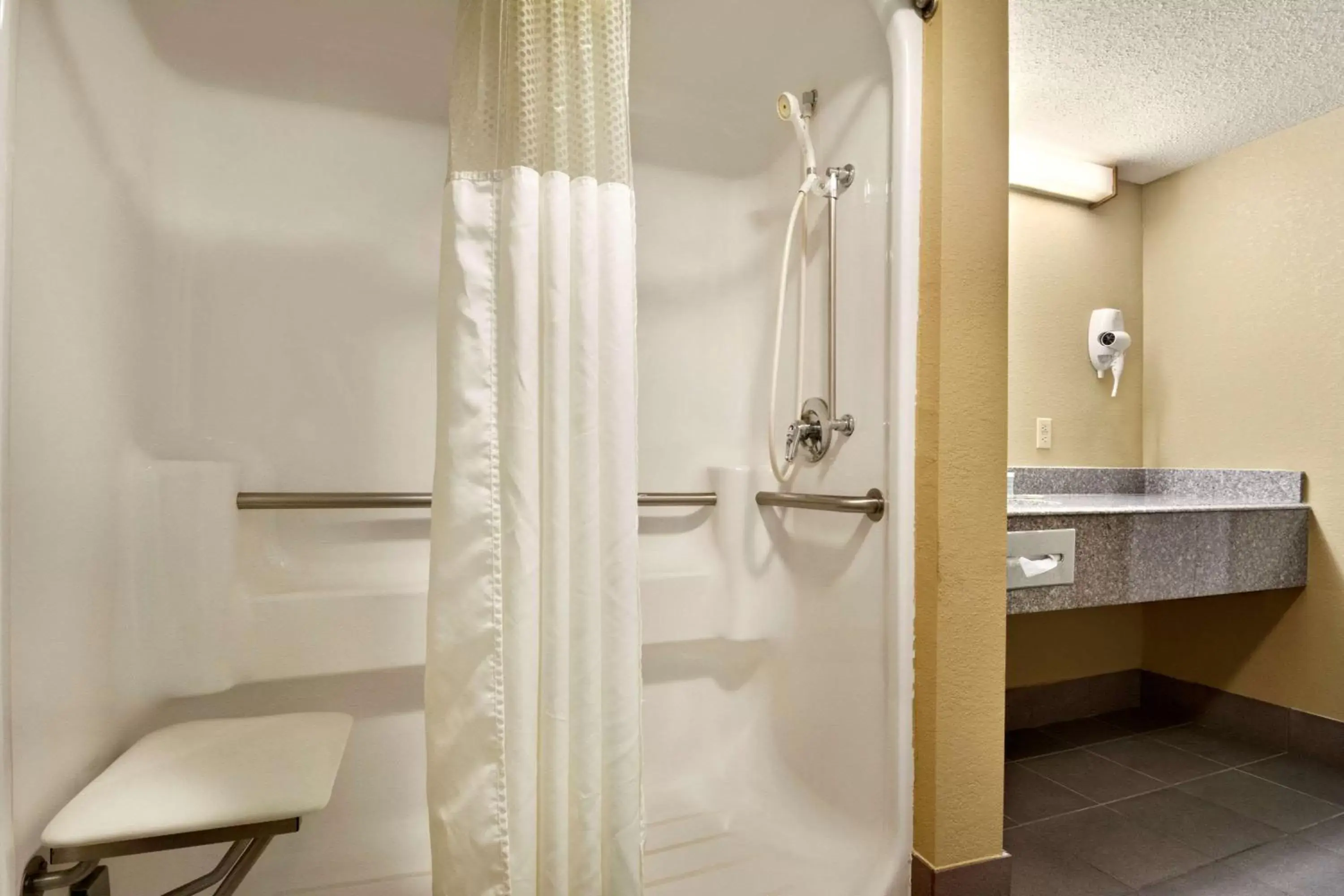 Bathroom in Super 8 by Wyndham Hattiesburg North