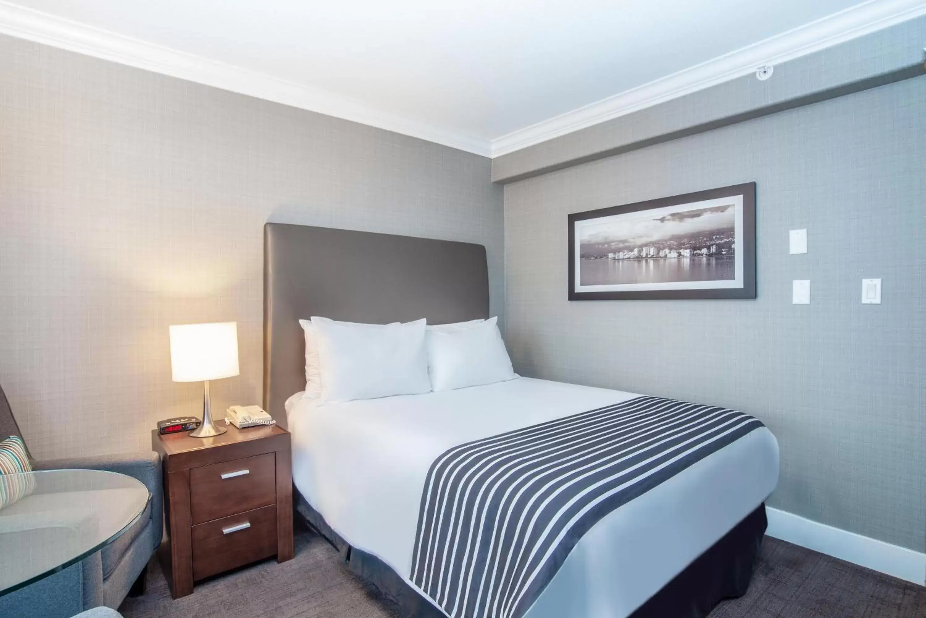 Photo of the whole room, Bed in Sandman Hotel Vancouver Airport