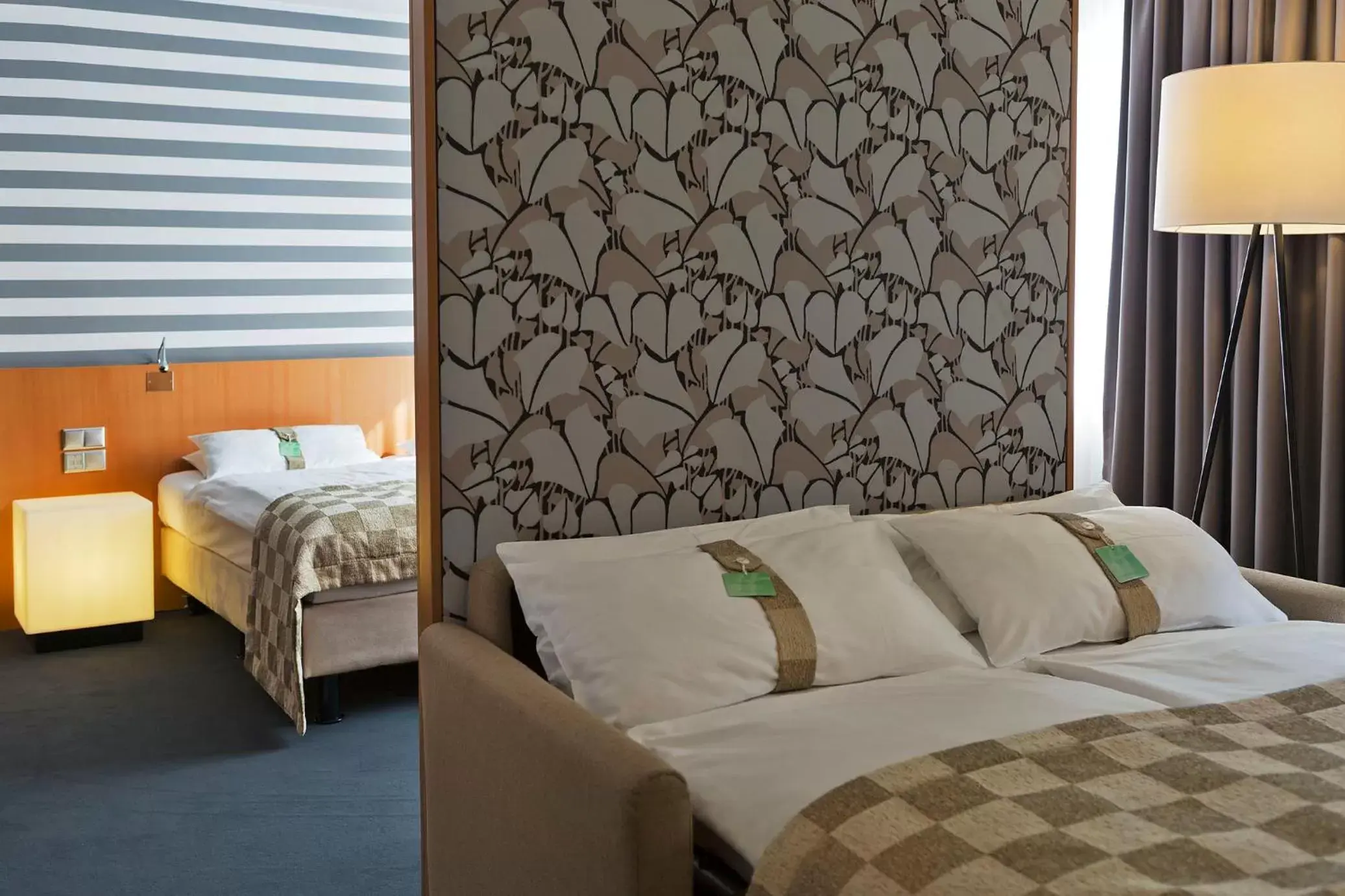 Bed in Holiday Inn Vienna City, an IHG Hotel