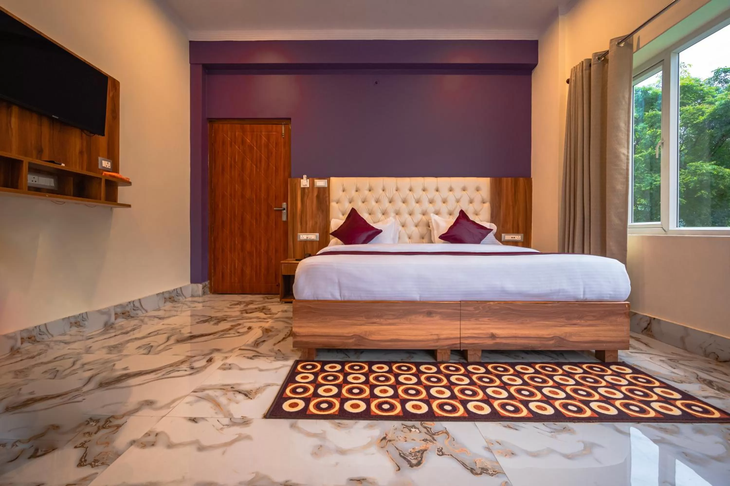 Bed in Hotel Rishikesh Grand by Kool Stays