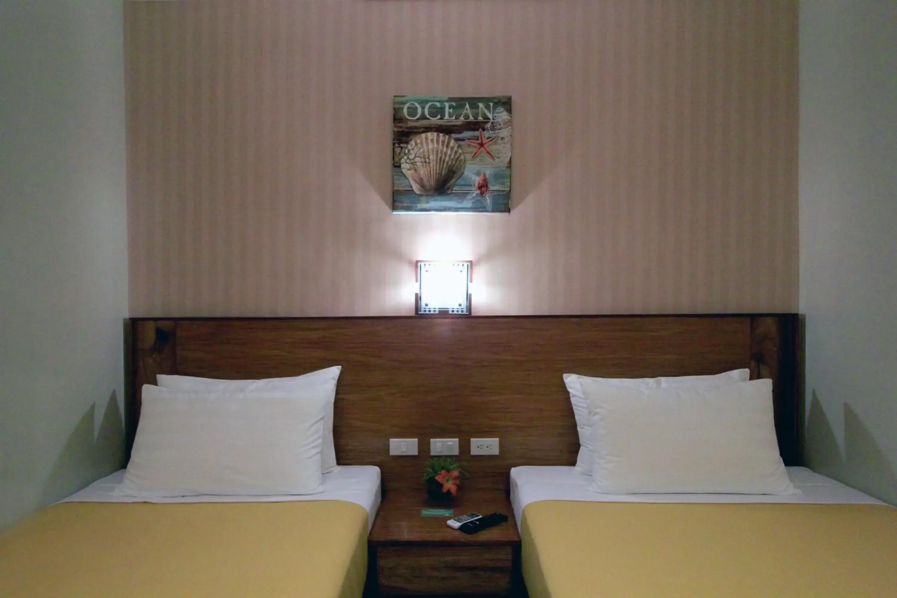 Bed in Coron Soleil Express Hotel