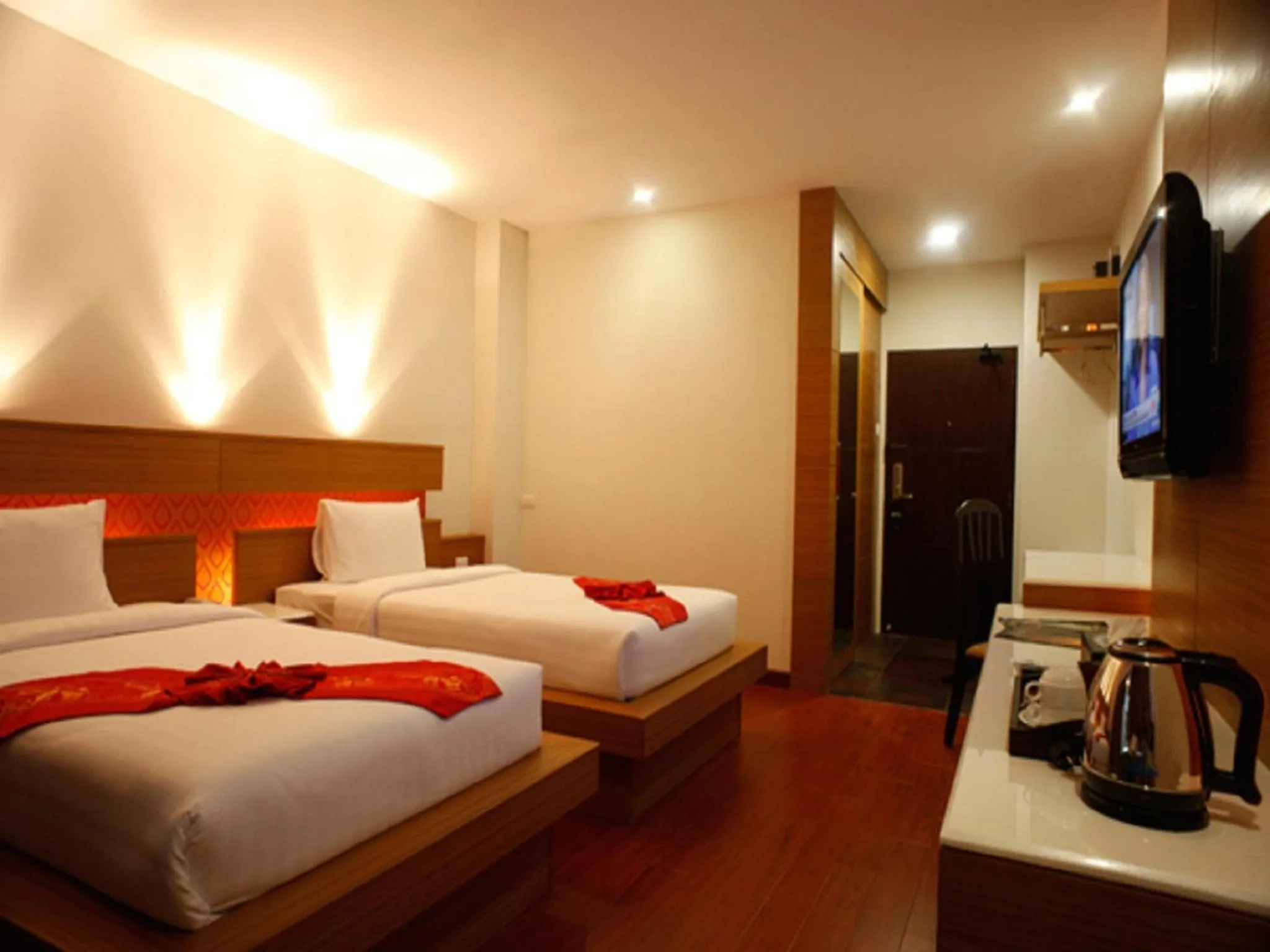 Bed in Suvarnabhumi Suite Hotel