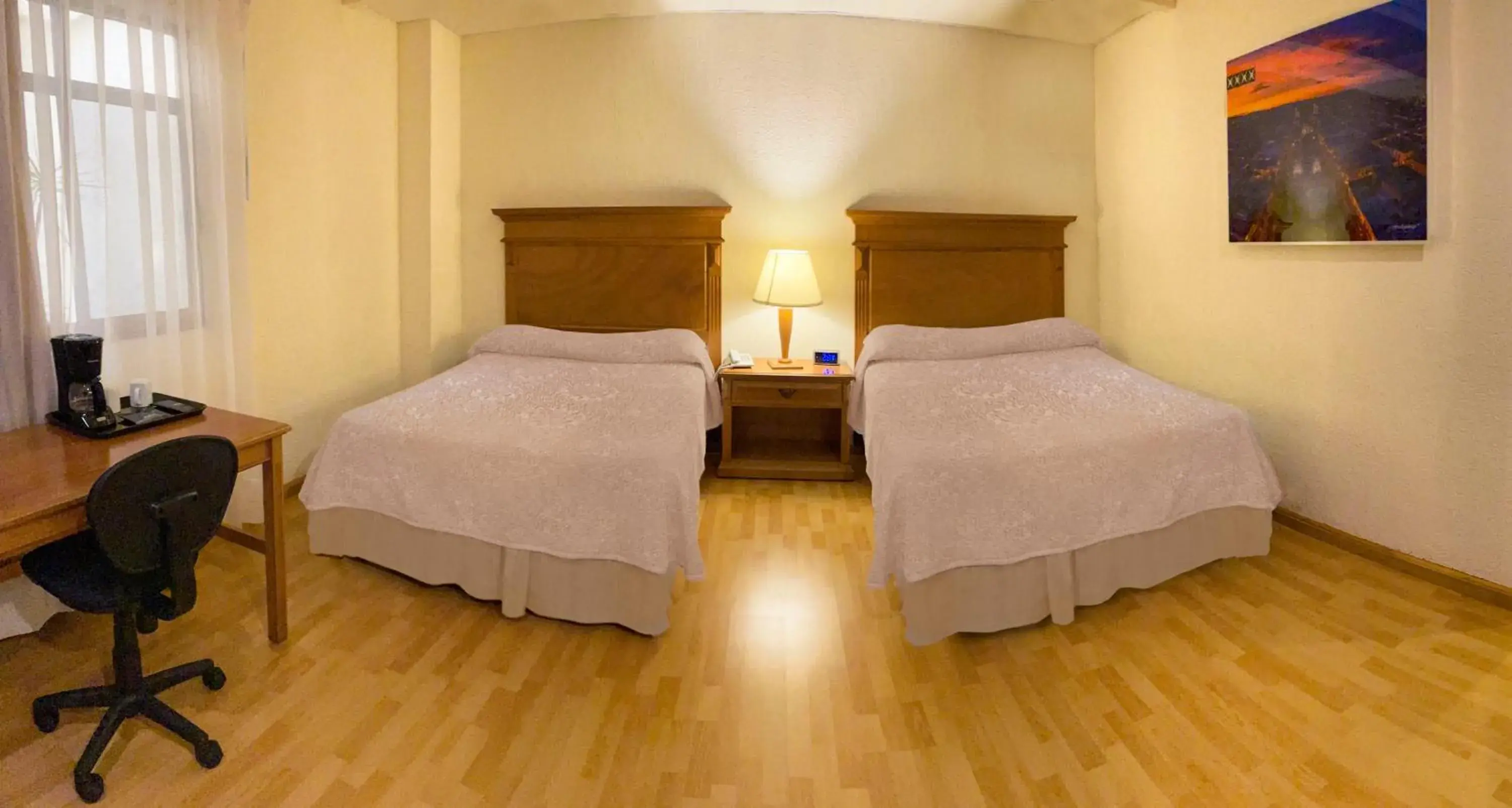 Bed in Hotel Lagos Inn