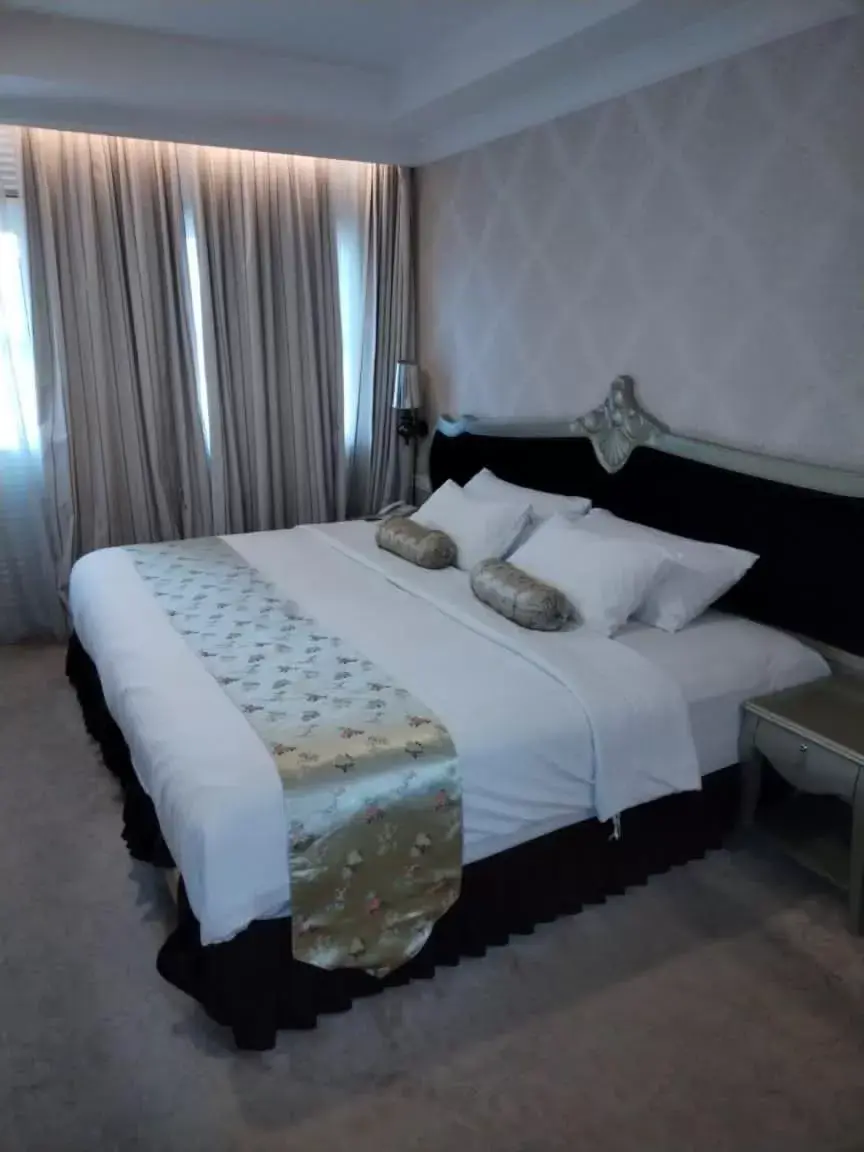 Bed in RC Hotel Melaka