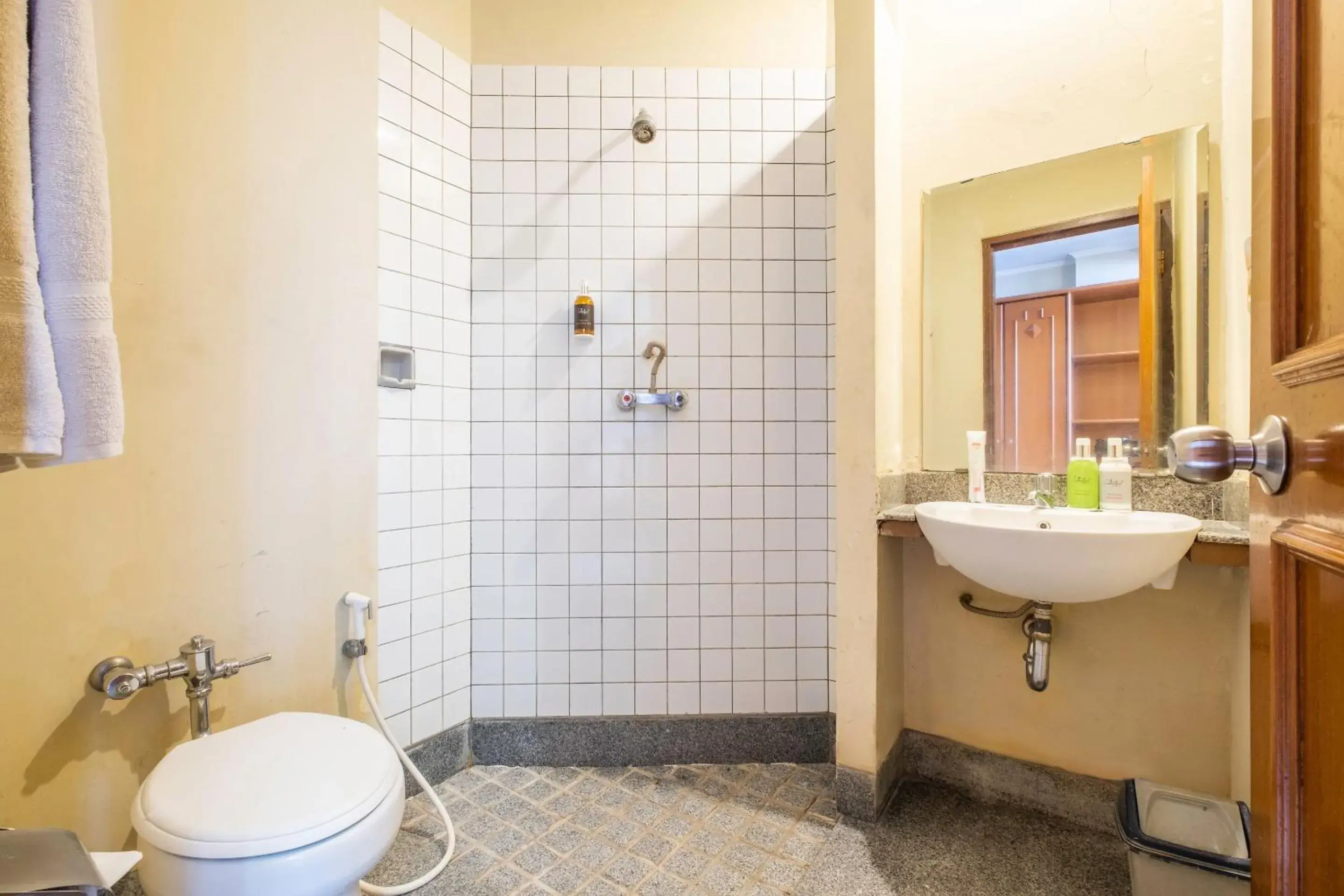 Bathroom in SUPER OYO Collection O 25 Hotel Baltika